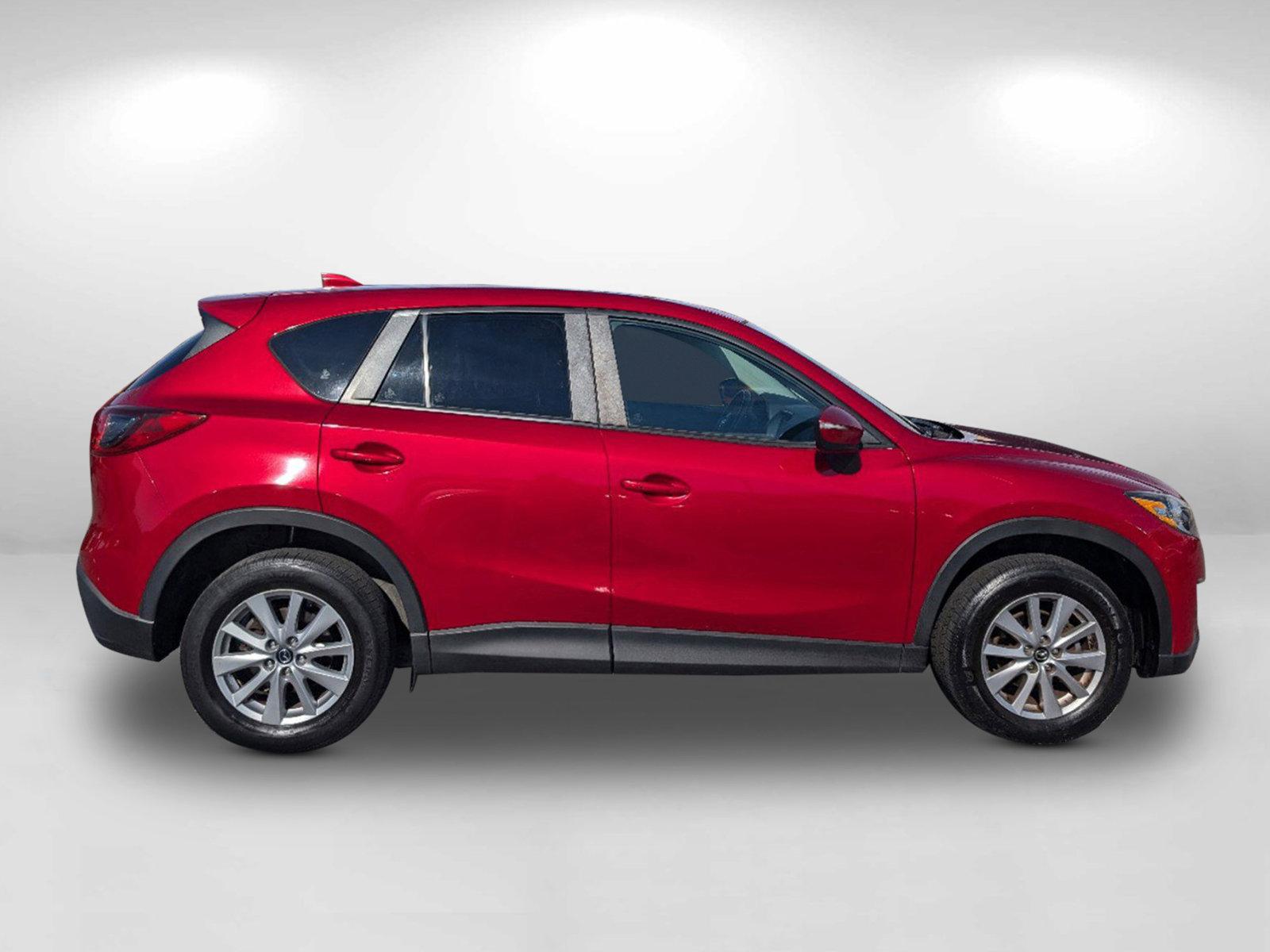 2016 /Black Mazda CX-5 Touring (JM3KE4CY2G0) with an Regular Unleaded I-4 2.5 L/152 engine, 6-Speed Automatic w/OD transmission, located at 804 22nd Ave, Phenix City, AL, 36870, (334) 297-1860, 32.484749, -85.024475 - 2016 Mazda CX-5 Touring - Photo#3