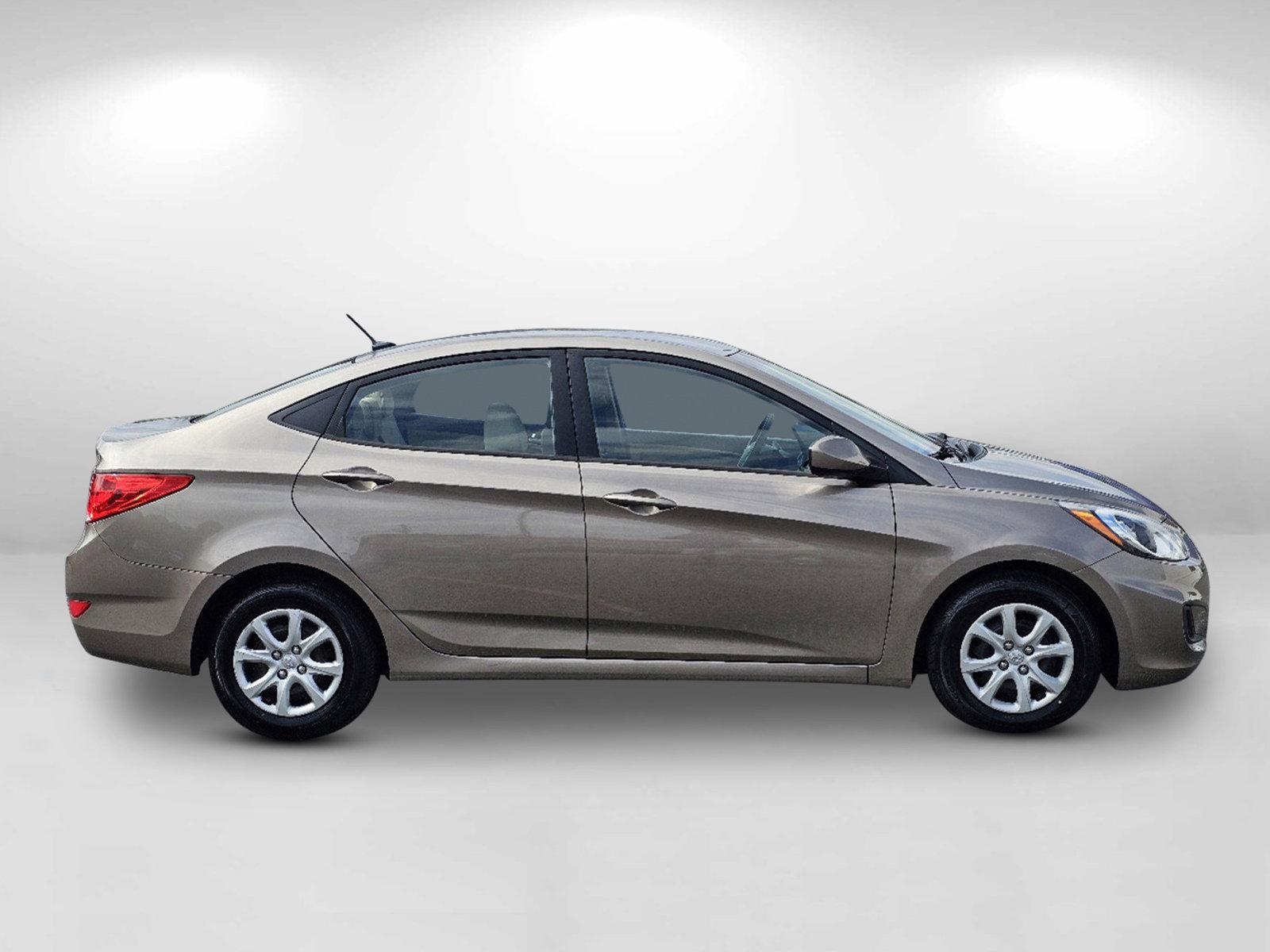 2014 Mocho Bronze Metallic /Beige Hyundai Accent GLS (KMHCT4AE4EU) with an Regular Unleaded I-4 1.6 L/97 engine, 6-Speed Automatic w/OD transmission, located at 1430 Gateway Drive, Opelika, AL, 36801, (334) 239-0944, 32.637871, -85.409790 - 2014 Hyundai Accent GLS - Photo#4