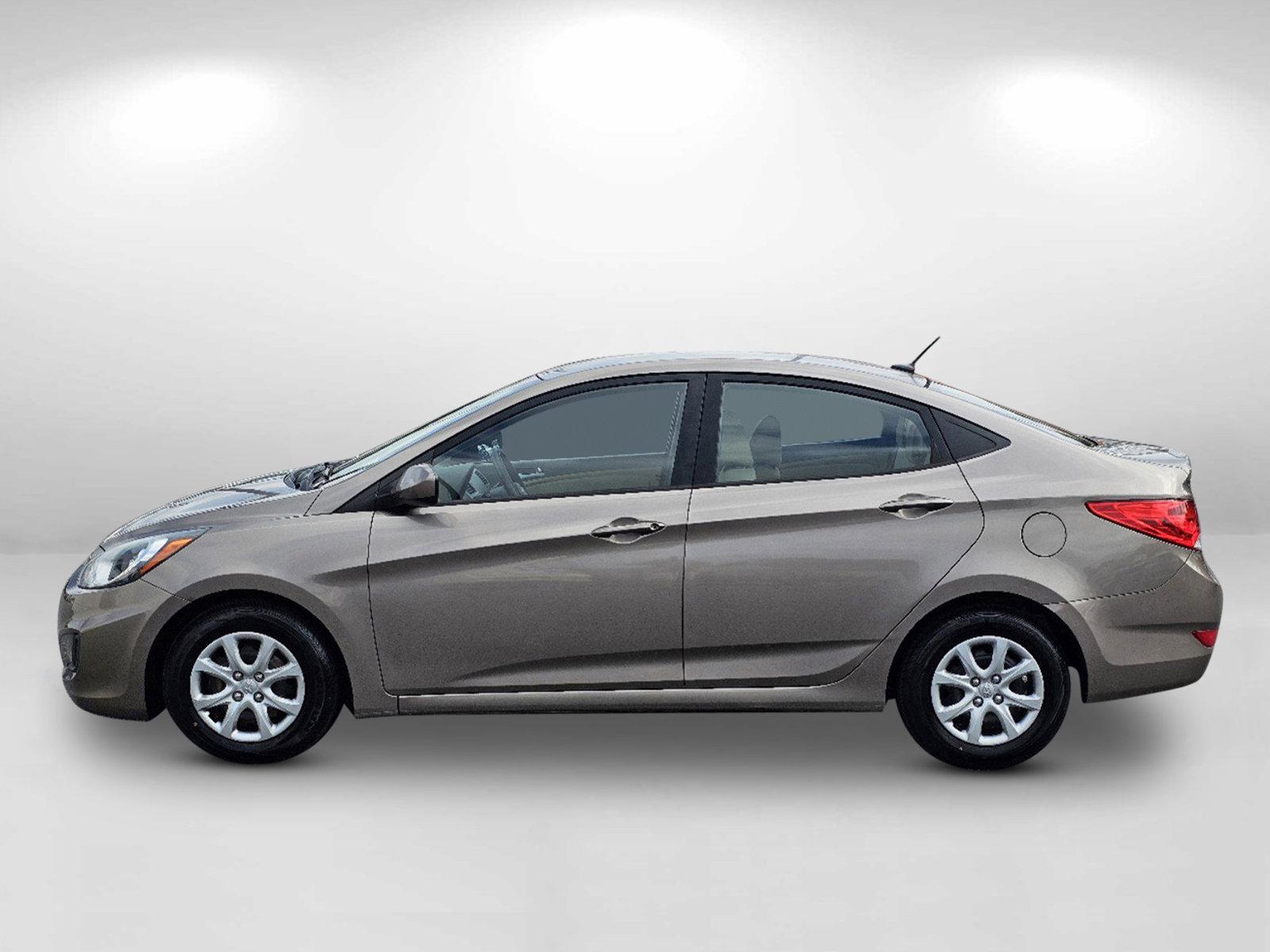 2014 Mocho Bronze Metallic /Beige Hyundai Accent GLS (KMHCT4AE4EU) with an Regular Unleaded I-4 1.6 L/97 engine, 6-Speed Automatic w/OD transmission, located at 1430 Gateway Drive, Opelika, AL, 36801, (334) 239-0944, 32.637871, -85.409790 - 2014 Hyundai Accent GLS - Photo#8