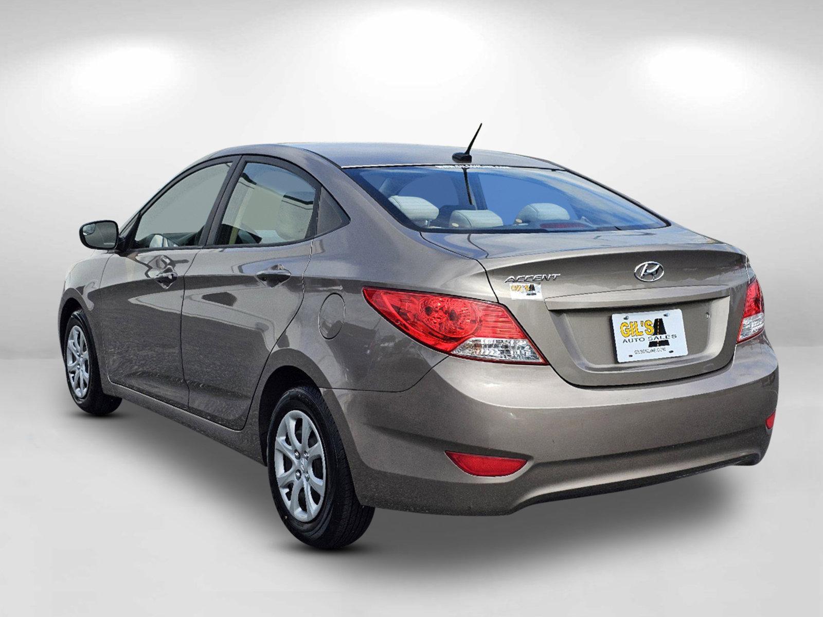 2014 Mocho Bronze Metallic /Beige Hyundai Accent GLS (KMHCT4AE4EU) with an Regular Unleaded I-4 1.6 L/97 engine, 6-Speed Automatic w/OD transmission, located at 3959 U.S. 80 W, Phenix City, AL, 36870, (334) 297-4885, 32.469296, -85.135185 - 2014 Hyundai Accent GLS - Photo#6