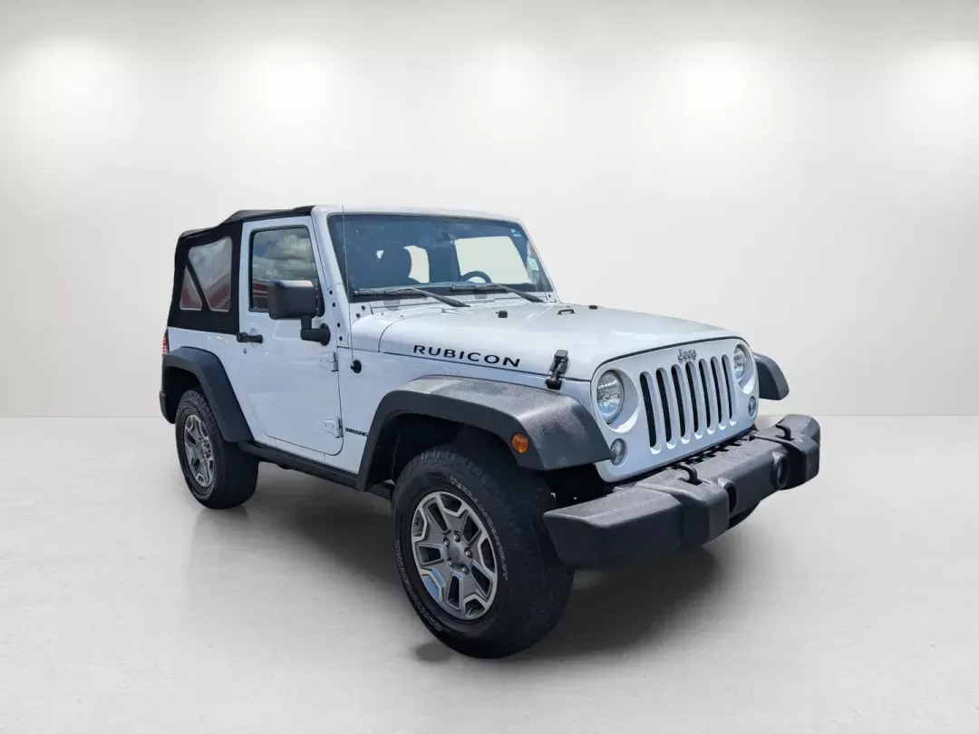 2015 Bright White Clearcoat /Black Jeep Wrangler Rubicon (1C4BJWCG4FL) with an Regular Unleaded V-6 3.6 L/220 engine, 5-Speed Automatic w/OD transmission, located at 1430 Gateway Drive, Opelika, AL, 36801, (334) 239-0944, 32.637871, -85.409790 - 2015 Jeep Wrangler Rubicon - Photo#2