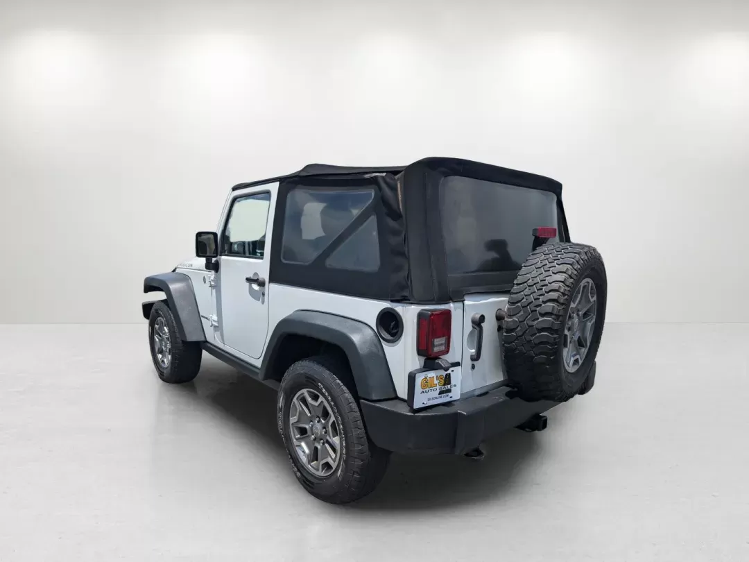 2015 Bright White Clearcoat /Black Jeep Wrangler Rubicon (1C4BJWCG4FL) with an Regular Unleaded V-6 3.6 L/220 engine, 5-Speed Automatic w/OD transmission, located at 1430 Gateway Drive, Opelika, AL, 36801, (334) 239-0944, 32.637871, -85.409790 - 2015 Jeep Wrangler Rubicon - Photo#6
