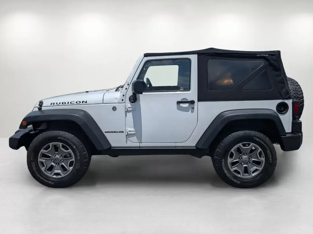 2015 Bright White Clearcoat /Black Jeep Wrangler Rubicon (1C4BJWCG4FL) with an Regular Unleaded V-6 3.6 L/220 engine, 5-Speed Automatic w/OD transmission, located at 1430 Gateway Drive, Opelika, AL, 36801, (334) 239-0944, 32.637871, -85.409790 - 2015 Jeep Wrangler Rubicon - Photo#7