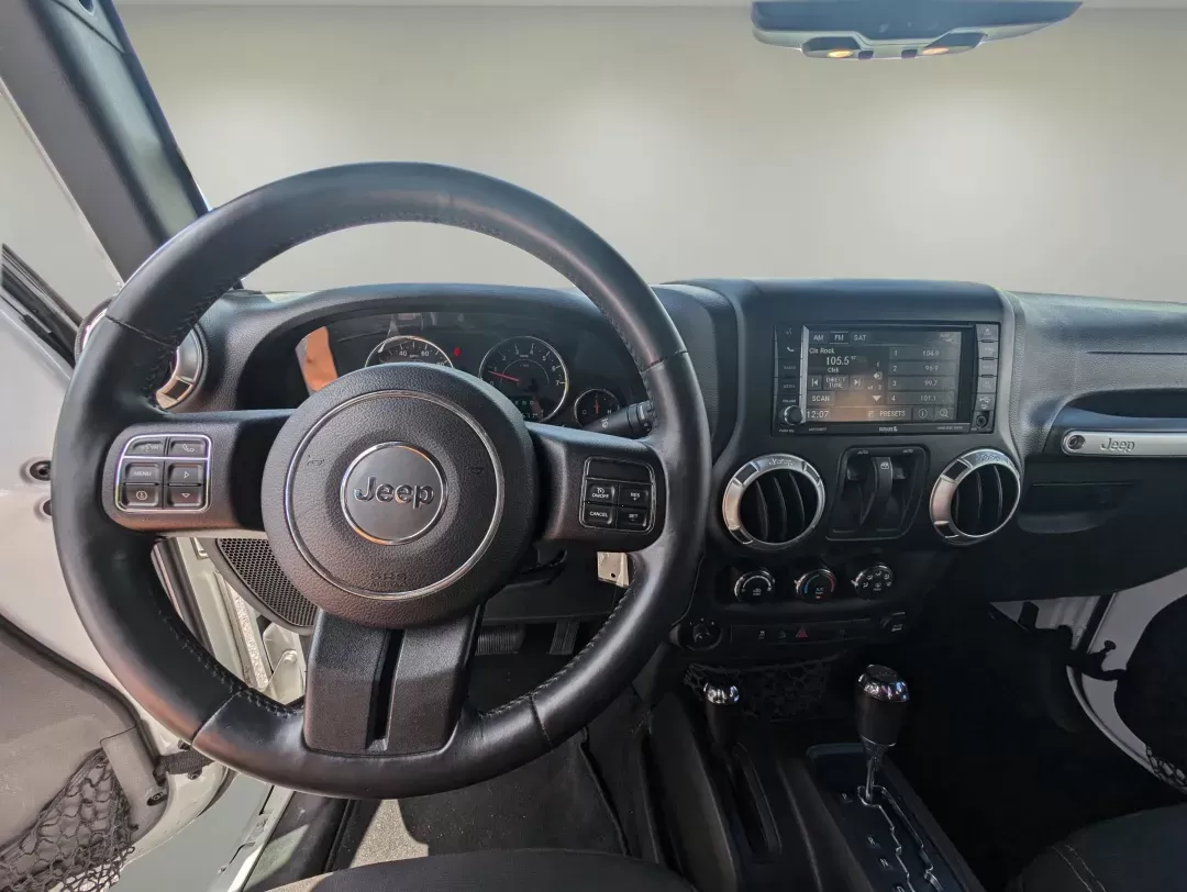 2015 Bright White Clearcoat /Black Jeep Wrangler Rubicon (1C4BJWCG4FL) with an Regular Unleaded V-6 3.6 L/220 engine, 5-Speed Automatic w/OD transmission, located at 1430 Gateway Drive, Opelika, AL, 36801, (334) 239-0944, 32.637871, -85.409790 - 2015 Jeep Wrangler Rubicon - Photo#11