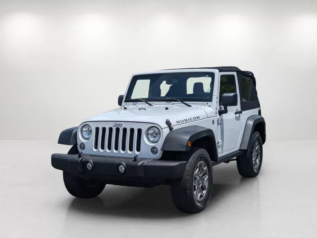 2015 Bright White Clearcoat /Black Jeep Wrangler Rubicon (1C4BJWCG4FL) with an Regular Unleaded V-6 3.6 L/220 engine, 5-Speed Automatic w/OD transmission, located at 1430 Gateway Drive, Opelika, AL, 36801, (334) 239-0944, 32.637871, -85.409790 - 2015 Jeep Wrangler Rubicon - Photo#0