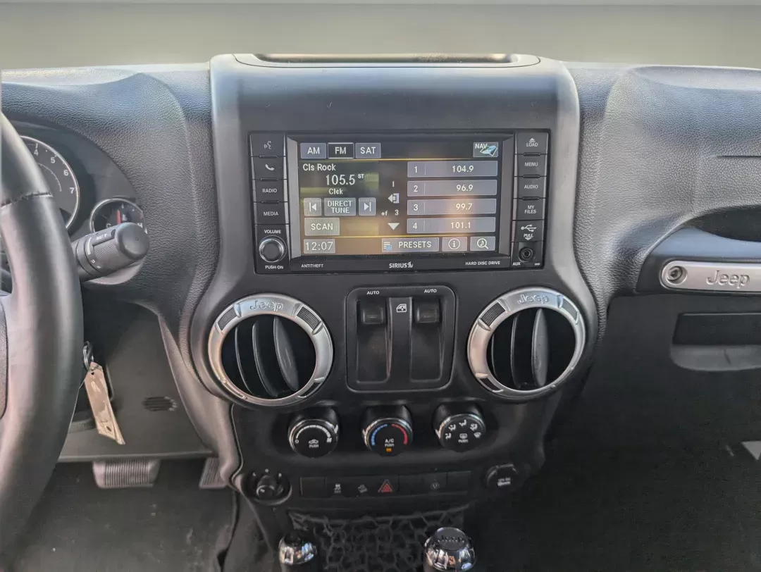 2015 Bright White Clearcoat /Black Jeep Wrangler Rubicon (1C4BJWCG4FL) with an Regular Unleaded V-6 3.6 L/220 engine, 5-Speed Automatic w/OD transmission, located at 7000 Northlake Connector, Columbus, GA, 31904, (706) 987-8085, 32.524975, -84.978134 - 2015 Jeep Wrangler Rubicon - Photo#14