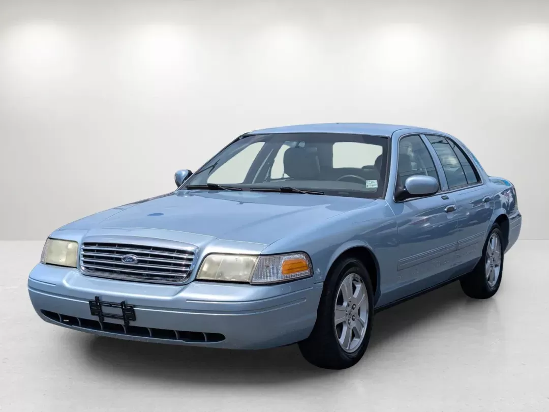 2011 Ford Crown Victoria LX (2FABP7EV6BX) with an Gas/Ethanol V8 4.6L/281 engine, 4-Speed Automatic w/OD transmission, located at 1430 Gateway Drive, Opelika, AL, 36801, (334) 239-0944, 32.637871, -85.409790 - 2011 Ford Crown Victoria LX - Photo#0