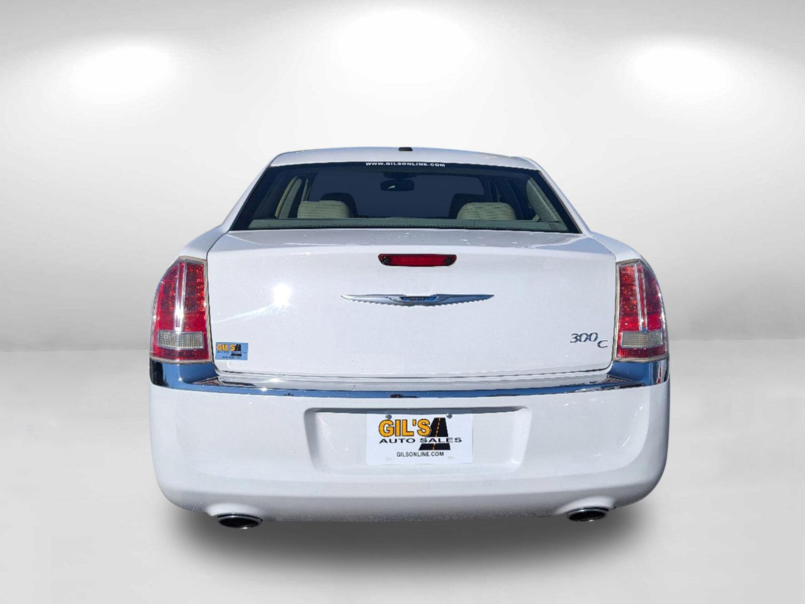 2014 /Lt Frost/Dk Frost Beige Chrysler 300 300C (2C3CCAEG5EH) with an Regular Unleaded V-6 3.6 L/220 engine, 8-Speed Automatic w/OD transmission, located at 3959 U.S. 80 W, Phenix City, AL, 36870, (334) 297-4885, 32.469296, -85.135185 - 2014 Chrysler 300 300C - Photo#6