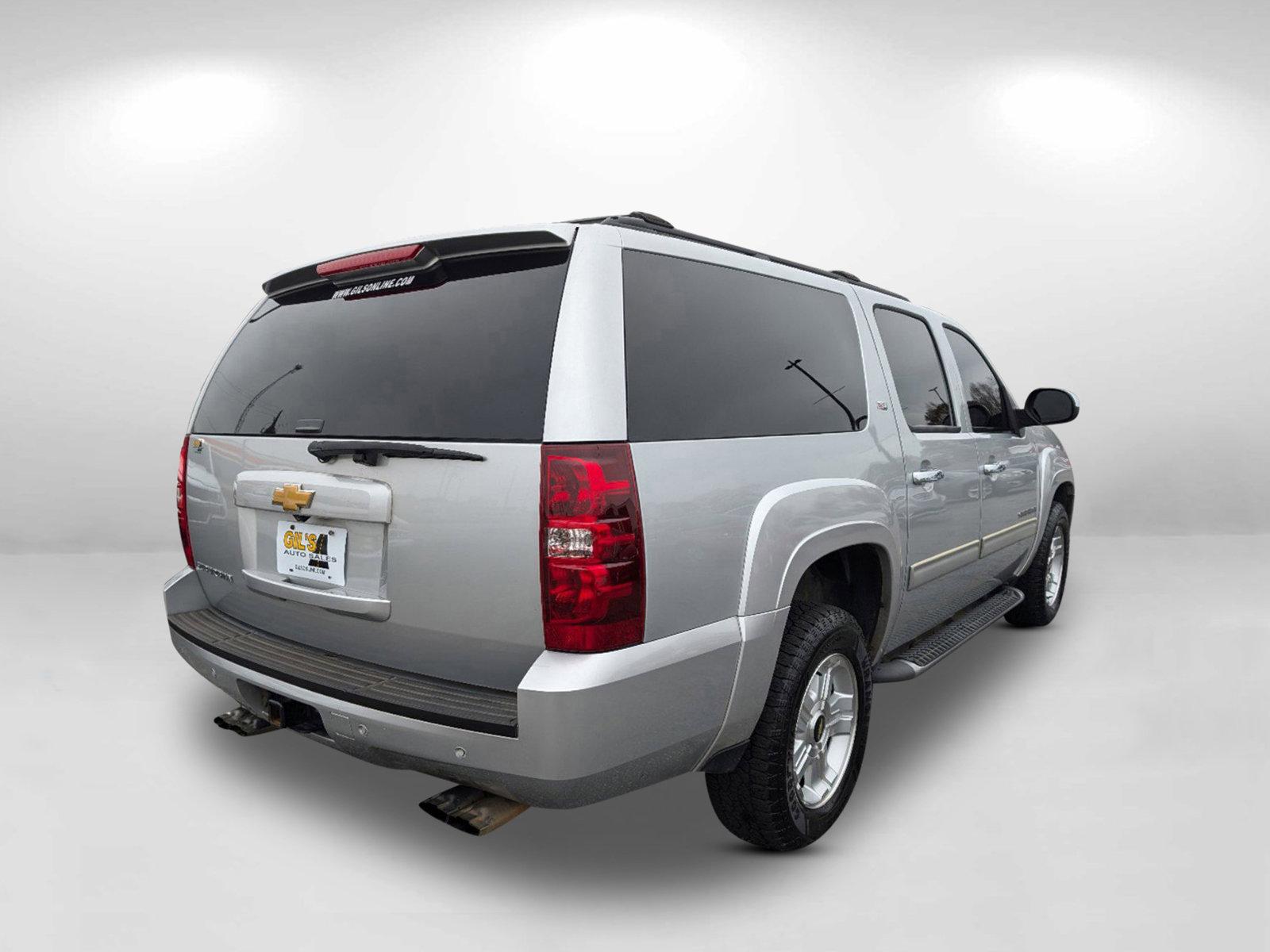 2013 /Ebony Chevrolet Suburban LT (1GNSKJE77DR) with an Gas/Ethanol V8 5.3L/323 engine, 6-Speed Automatic transmission, located at 1430 Gateway Drive, Opelika, AL, 36801, (334) 239-0944, 32.637871, -85.409790 - 2013 Chevrolet Suburban LT - Photo#6