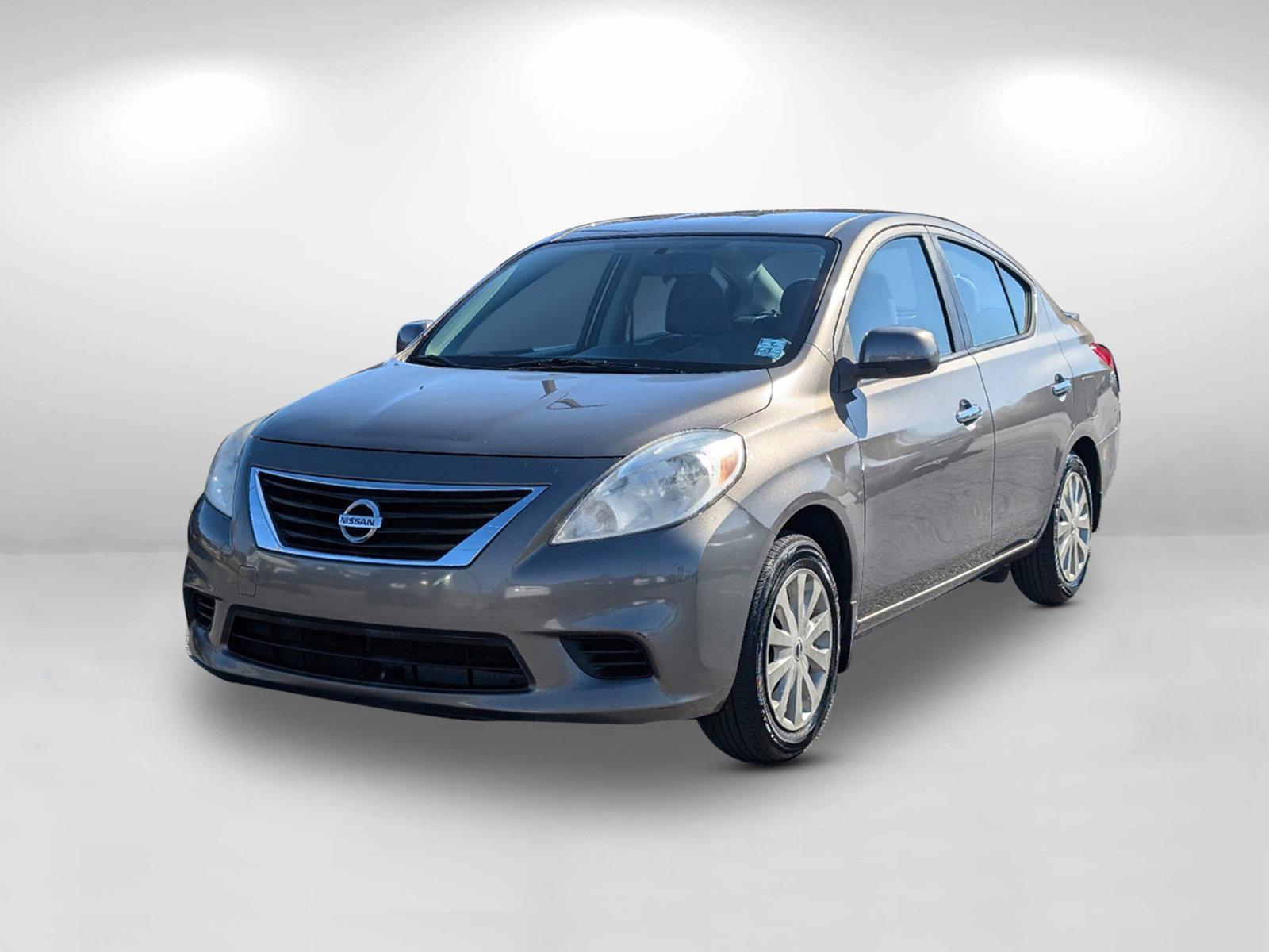 2014 /Charcoal Nissan Versa SV (3N1CN7AP9EL) with an Regular Unleaded I-4 1.6 L/98 engine, 1-Speed CVT w/OD transmission, located at 1430 Gateway Drive, Opelika, AL, 36801, (334) 239-0944, 32.637871, -85.409790 - 2014 Nissan Versa SV - Photo#0