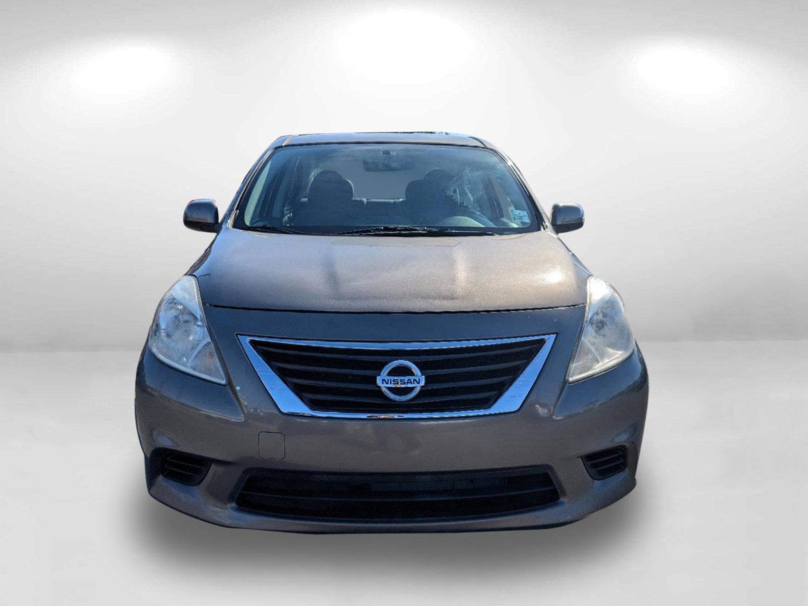 2014 /Charcoal Nissan Versa SV (3N1CN7AP9EL) with an Regular Unleaded I-4 1.6 L/98 engine, 1-Speed CVT w/OD transmission, located at 1430 Gateway Drive, Opelika, AL, 36801, (334) 239-0944, 32.637871, -85.409790 - 2014 Nissan Versa SV - Photo#1