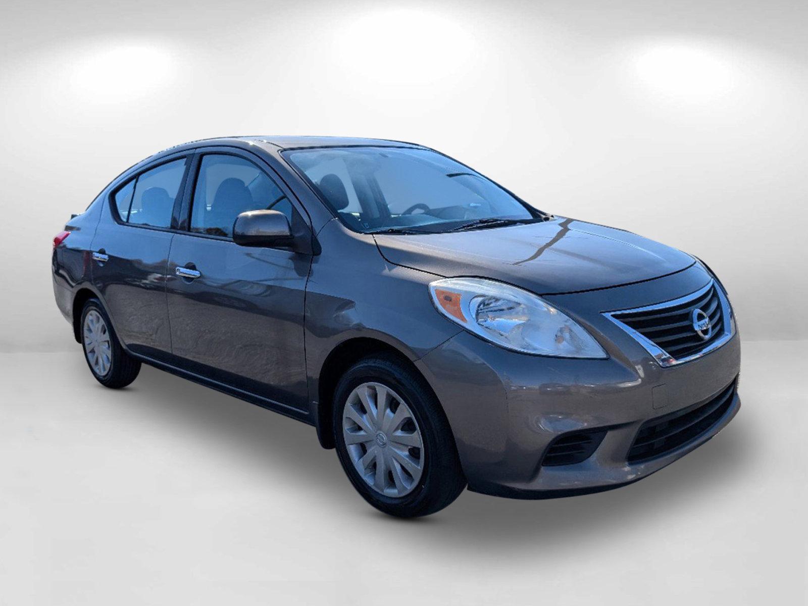 2014 /Charcoal Nissan Versa SV (3N1CN7AP9EL) with an Regular Unleaded I-4 1.6 L/98 engine, 1-Speed CVT w/OD transmission, located at 1430 Gateway Drive, Opelika, AL, 36801, (334) 239-0944, 32.637871, -85.409790 - 2014 Nissan Versa SV - Photo#2