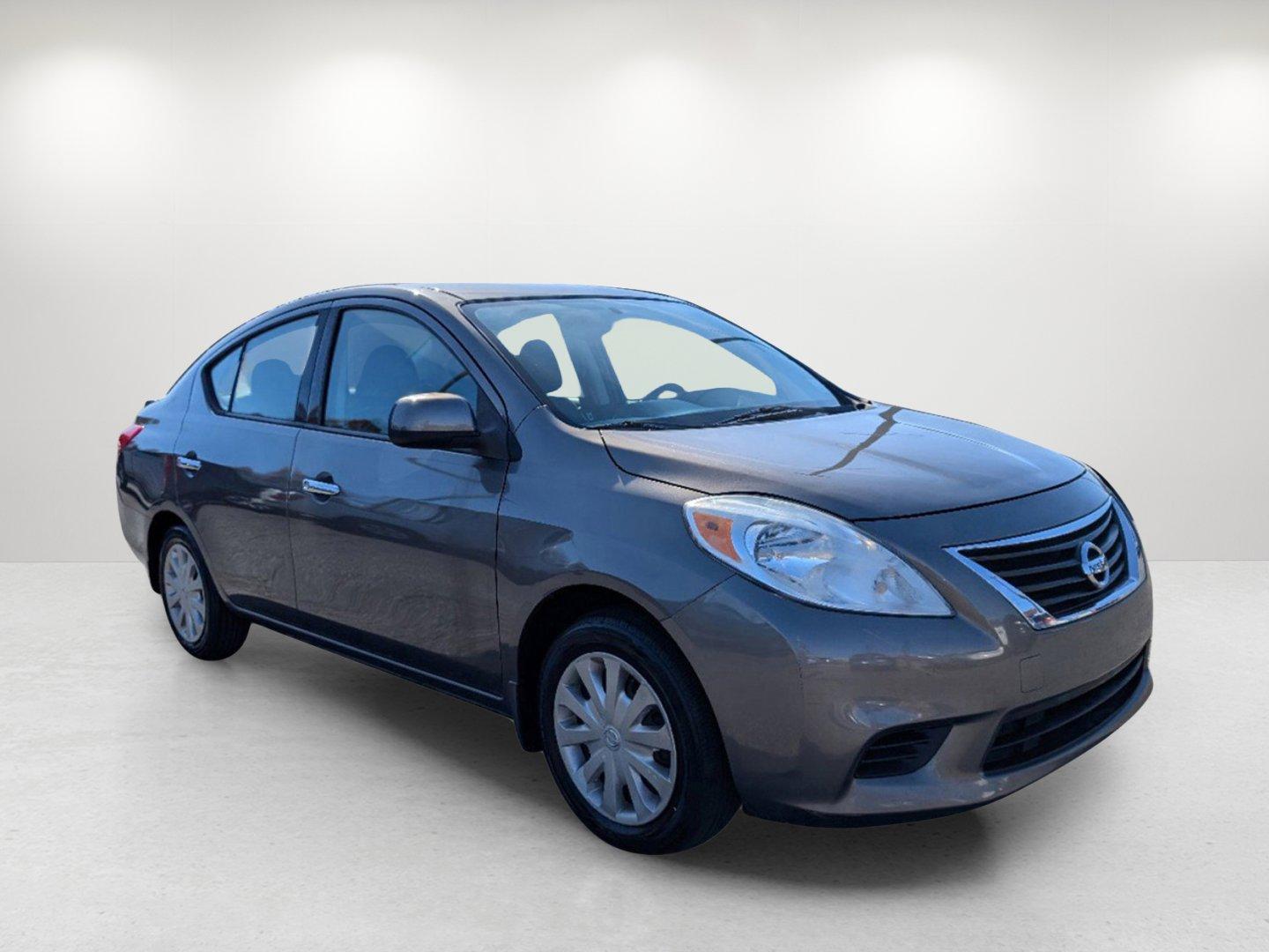 2014 /Charcoal Nissan Versa SV (3N1CN7AP9EL) with an Regular Unleaded I-4 1.6 L/98 engine, 1-Speed CVT w/OD transmission, located at 804 22nd Ave, Phenix City, AL, 36870, (334) 297-1860, 32.484749, -85.024475 - 2014 Nissan Versa SV - Photo#2