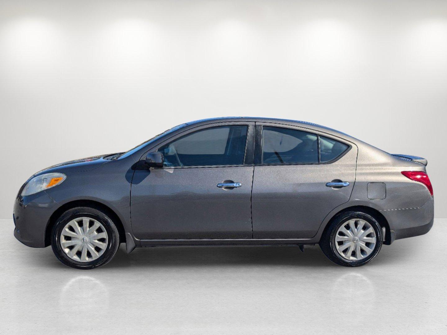 2014 /Charcoal Nissan Versa SV (3N1CN7AP9EL) with an Regular Unleaded I-4 1.6 L/98 engine, 1-Speed CVT w/OD transmission, located at 804 22nd Ave, Phenix City, AL, 36870, (334) 297-1860, 32.484749, -85.024475 - 2014 Nissan Versa SV - Photo#7