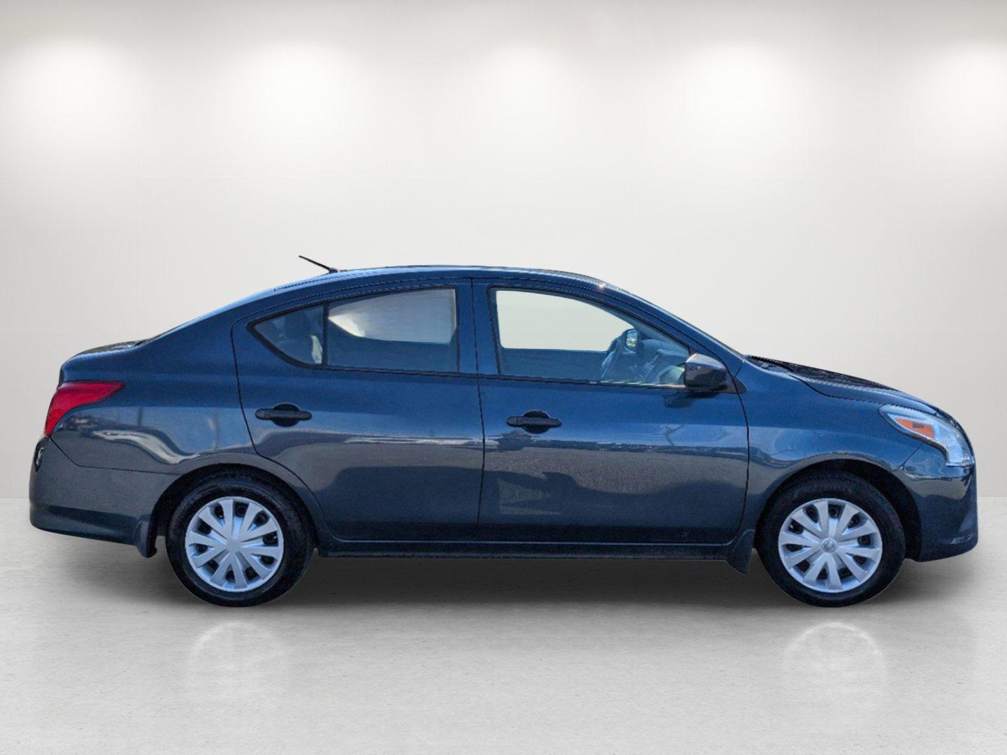 2016 /Charcoal Nissan Versa S (3N1CN7AP7GL) with an Regular Unleaded I-4 1.6 L/98 engine, 5-Speed Manual w/OD transmission, located at 7000 Northlake Connector, Columbus, GA, 31904, (706) 987-8085, 32.524975, -84.978134 - 2016 Nissan Versa S - Photo#3