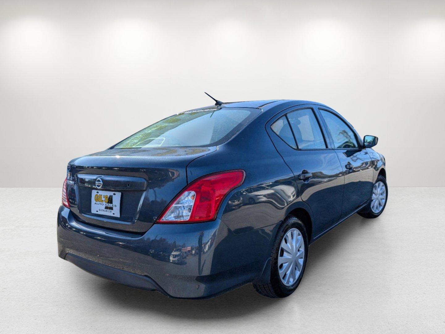 2016 /Charcoal Nissan Versa S (3N1CN7AP7GL) with an Regular Unleaded I-4 1.6 L/98 engine, 5-Speed Manual w/OD transmission, located at 7000 Northlake Connector, Columbus, GA, 31904, (706) 987-8085, 32.524975, -84.978134 - 2016 Nissan Versa S - Photo#4