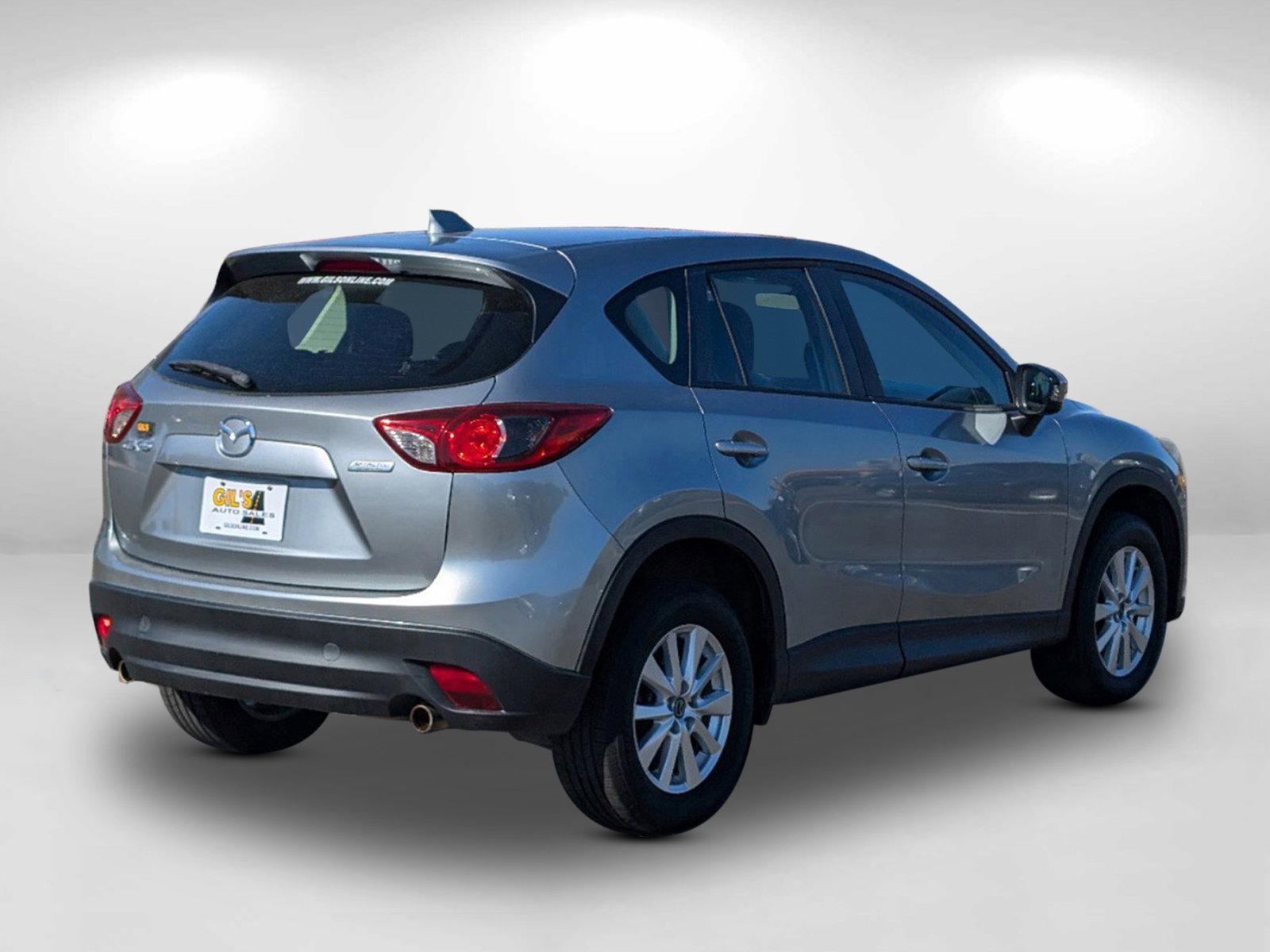 2014 Liquid Silver Metallic /Black Mazda CX-5 Sport (JM3KE2BE7E0) with an Regular Unleaded I-4 2.0 L/122 engine, 6-Speed Automatic w/OD transmission, located at 521 Old Farm Lane Rd, Prattville, AL, 36066, (334) 325-1505, 32.482460, -86.416367 - 2014 Mazda CX-5 Sport - Photo#4