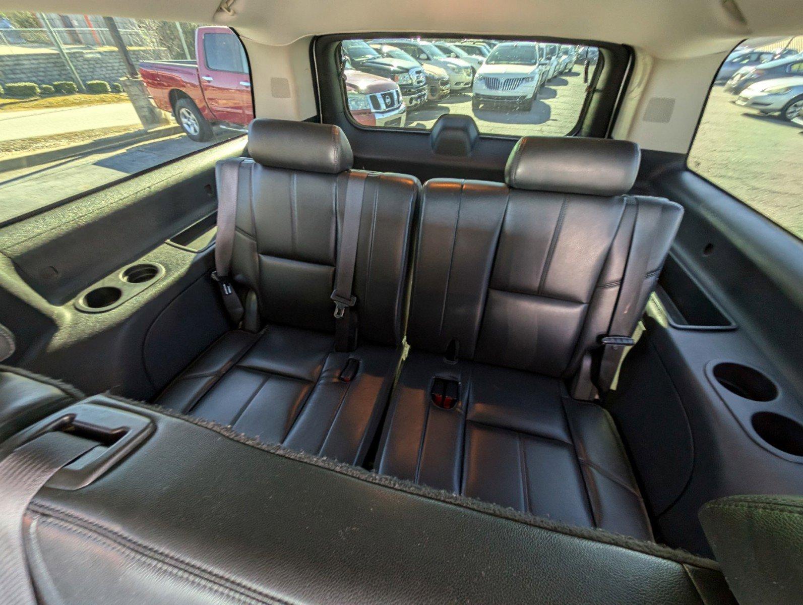 2014 /Ebony Chevrolet Suburban LT (1GNSCJE02ER) with an Gas/Ethanol V8 5.3L/323 engine, 6-Speed Automatic transmission, located at 3959 U.S. 80 W, Phenix City, AL, 36870, (334) 297-4885, 32.469296, -85.135185 - 2014 Chevrolet Suburban LT - Photo#1