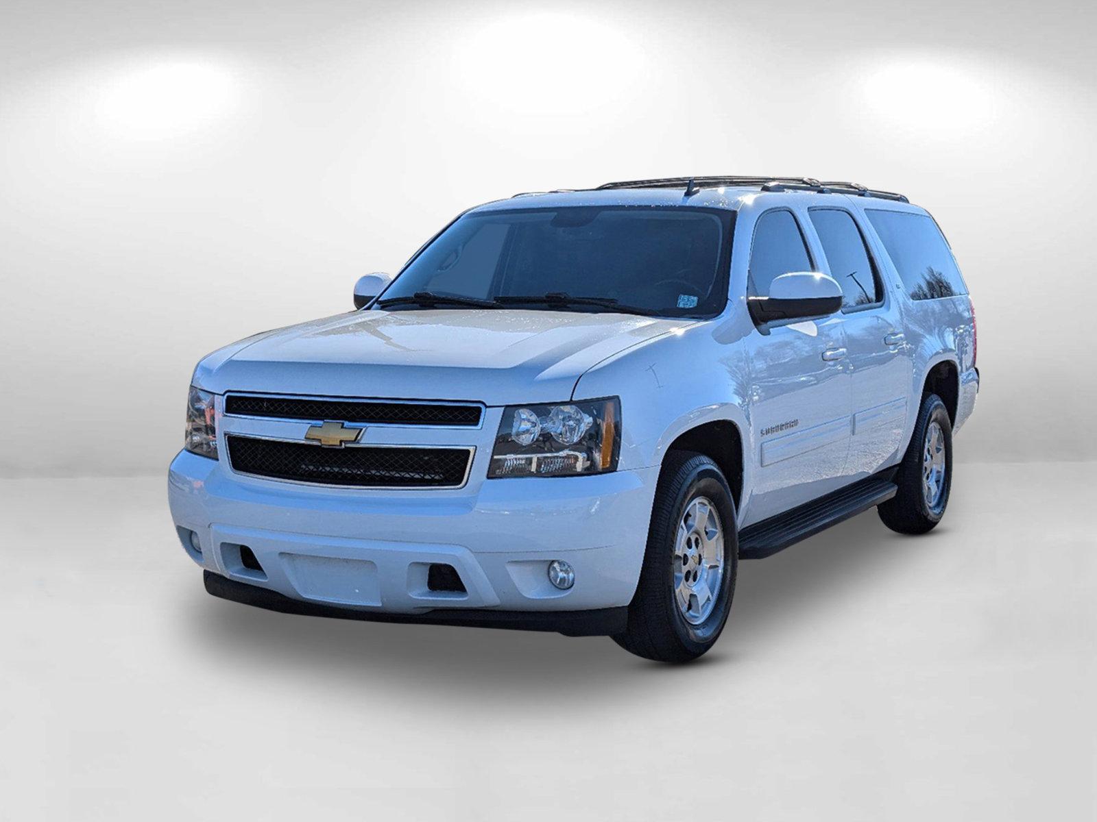 2014 /Ebony Chevrolet Suburban LT (1GNSCJE02ER) with an Gas/Ethanol V8 5.3L/323 engine, 6-Speed Automatic transmission, located at 3959 U.S. 80 W, Phenix City, AL, 36870, (334) 297-4885, 32.469296, -85.135185 - 2014 Chevrolet Suburban LT - Photo#4