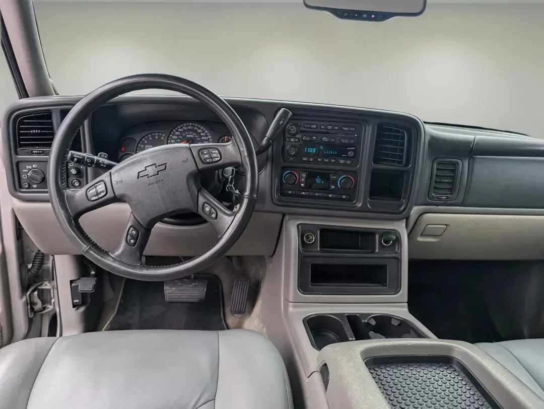 2004 /Gray/Dark Charcoal Chevrolet Suburban LT (3GNEC16Z94G) with an Other engine, located at 3959 U.S. 80 W, Phenix City, AL, 36870, (334) 297-4885, 32.469296, -85.135185 - **Discover Adventure with the 2004 Chevrolet Suburban LT at Gils Auto!**<br /> <br /> Are you ready to elevate your family road trips or weekend getaways? This 2004 Chevrolet Suburban LT, available at Gils Auto in Phenix City, AL, is your ticket to unforgettable experiences. With its spacious interi - Photo#12