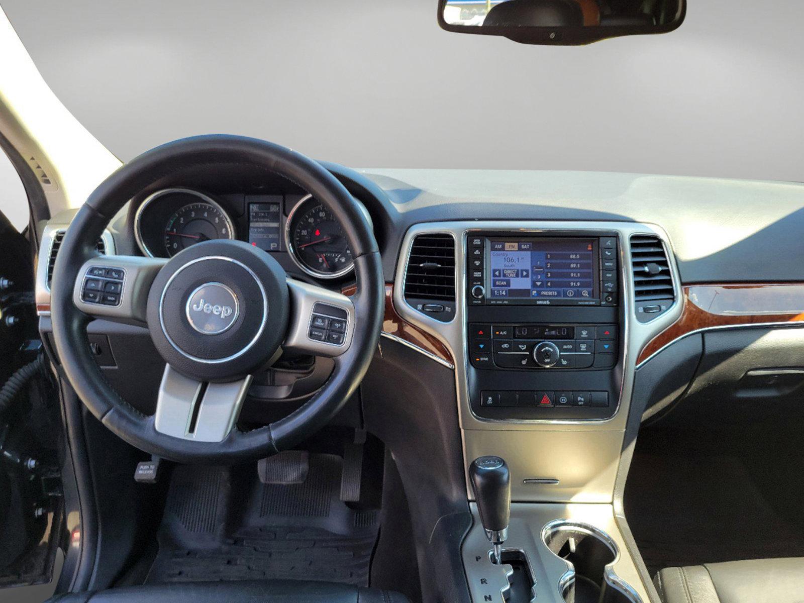 2012 Brilliant Black Crystal Pearl /Black Jeep Grand Cherokee Limited (1C4RJFBGXCC) with an Gas/Ethanol V6 3.6L/220 engine, 5-Speed Automatic transmission, located at 521 Old Farm Lane Rd, Prattville, AL, 36066, (334) 325-1505, 32.482460, -86.416367 - 2012 Jeep Grand Cherokee Limited - Photo#11