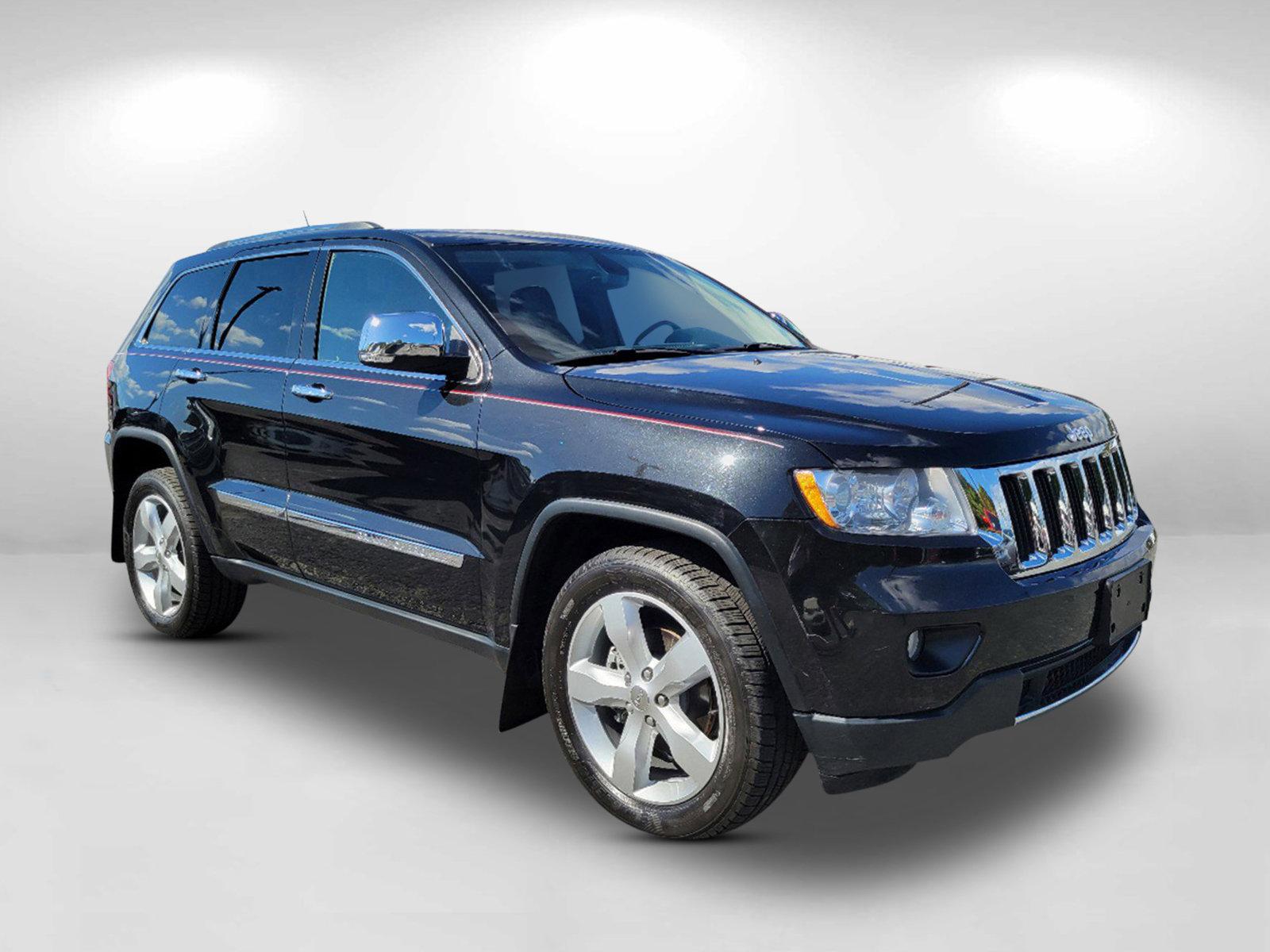 2012 Brilliant Black Crystal Pearl /Black Jeep Grand Cherokee Limited (1C4RJFBGXCC) with an Gas/Ethanol V6 3.6L/220 engine, 5-Speed Automatic transmission, located at 521 Old Farm Lane Rd, Prattville, AL, 36066, (334) 325-1505, 32.482460, -86.416367 - 2012 Jeep Grand Cherokee Limited - Photo#2