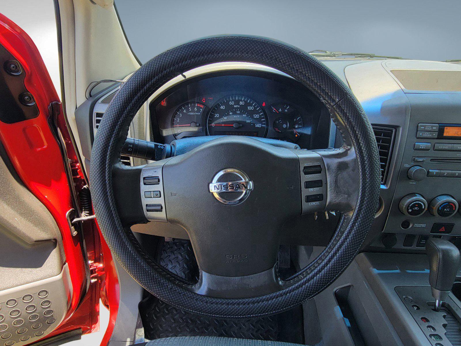 2006 Red Nissan Titan (1N6BA07BX6N) with an Gas/Ethanol V8 5.6L/339 engine, 5-Speed Automatic w/OD transmission, located at 3959 U.S. 80 W, Phenix City, AL, 36870, (334) 297-4885, 32.469296, -85.135185 - 2006 Nissan Titan - Photo#12