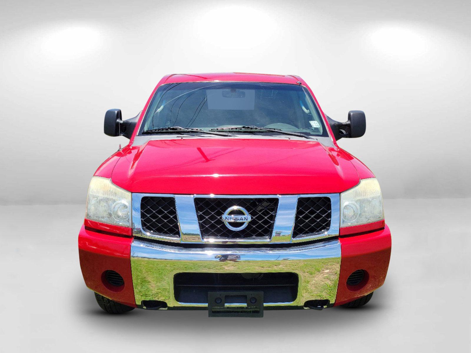 2006 Red Nissan Titan (1N6BA07BX6N) with an Gas/Ethanol V8 5.6L/339 engine, 5-Speed Automatic w/OD transmission, located at 3959 U.S. 80 W, Phenix City, AL, 36870, (334) 297-4885, 32.469296, -85.135185 - 2006 Nissan Titan - Photo#1