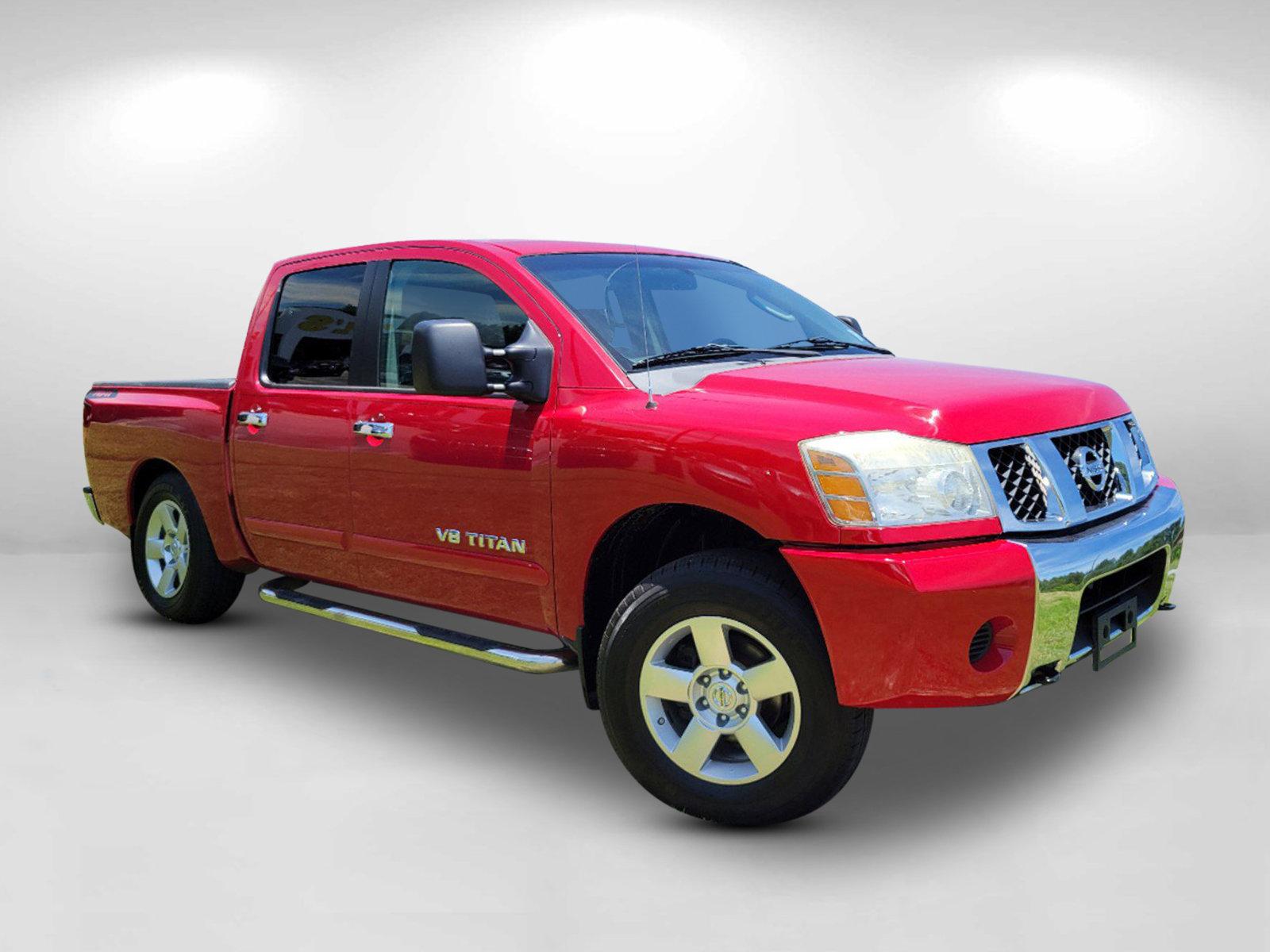 2006 Red Nissan Titan (1N6BA07BX6N) with an Gas/Ethanol V8 5.6L/339 engine, 5-Speed Automatic w/OD transmission, located at 3959 U.S. 80 W, Phenix City, AL, 36870, (334) 297-4885, 32.469296, -85.135185 - 2006 Nissan Titan - Photo#2