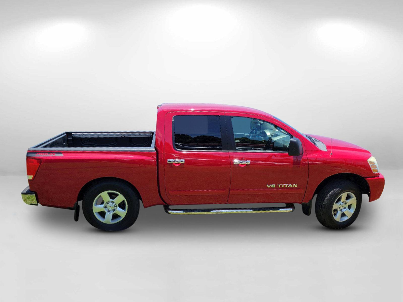 2006 Red Nissan Titan (1N6BA07BX6N) with an Gas/Ethanol V8 5.6L/339 engine, 5-Speed Automatic w/OD transmission, located at 3959 U.S. 80 W, Phenix City, AL, 36870, (334) 297-4885, 32.469296, -85.135185 - 2006 Nissan Titan - Photo#3