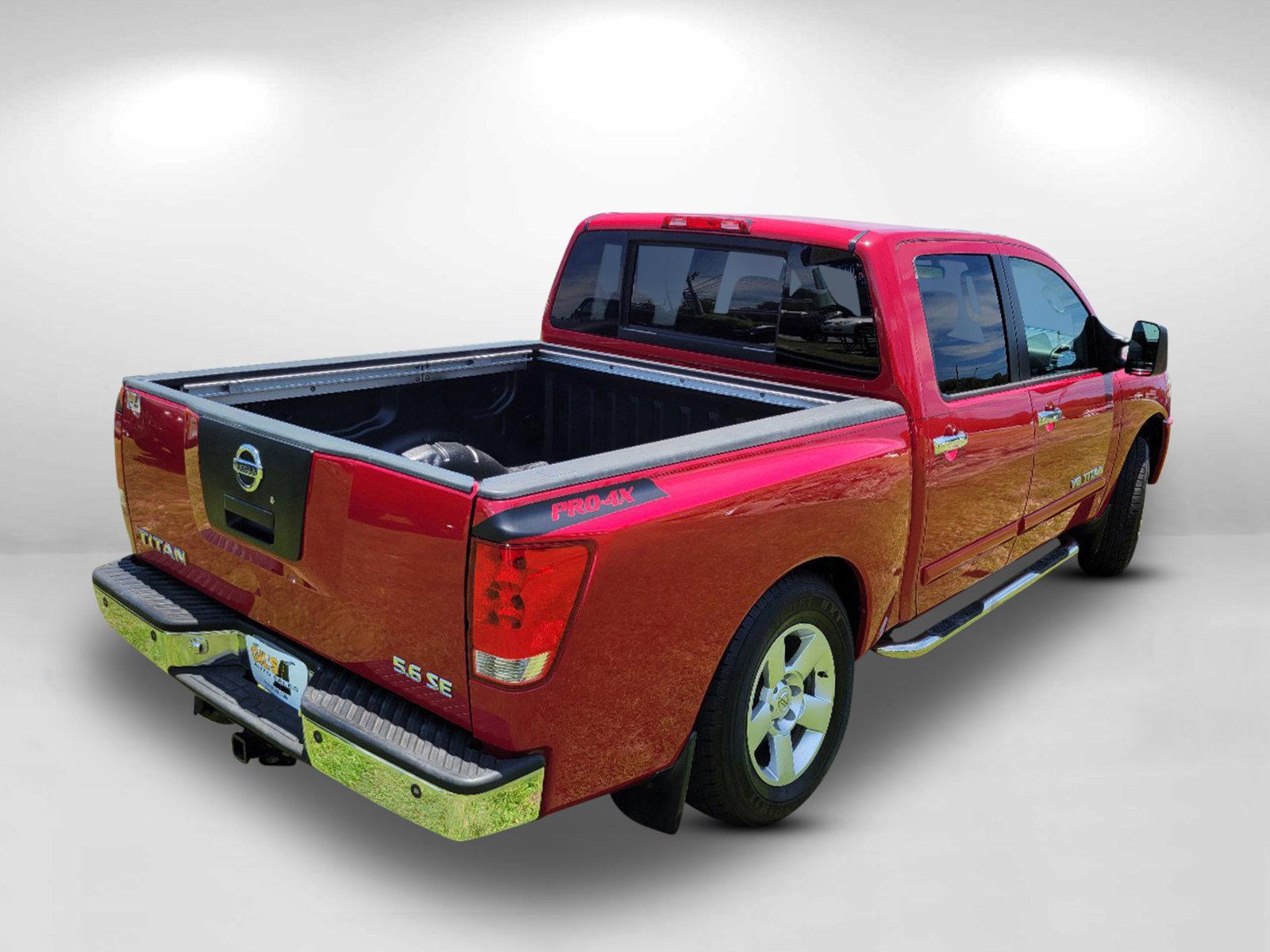 2006 Red Nissan Titan (1N6BA07BX6N) with an Gas/Ethanol V8 5.6L/339 engine, 5-Speed Automatic w/OD transmission, located at 3959 U.S. 80 W, Phenix City, AL, 36870, (334) 297-4885, 32.469296, -85.135185 - 2006 Nissan Titan - Photo#4