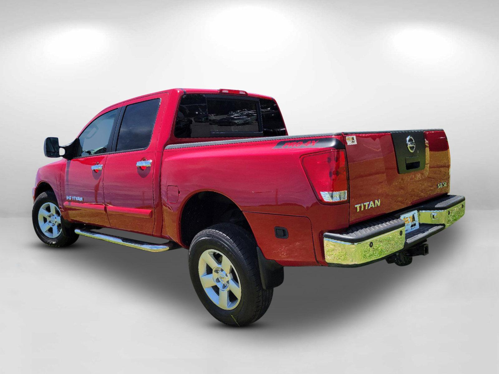 2006 Red Nissan Titan (1N6BA07BX6N) with an Gas/Ethanol V8 5.6L/339 engine, 5-Speed Automatic w/OD transmission, located at 3959 U.S. 80 W, Phenix City, AL, 36870, (334) 297-4885, 32.469296, -85.135185 - 2006 Nissan Titan - Photo#6