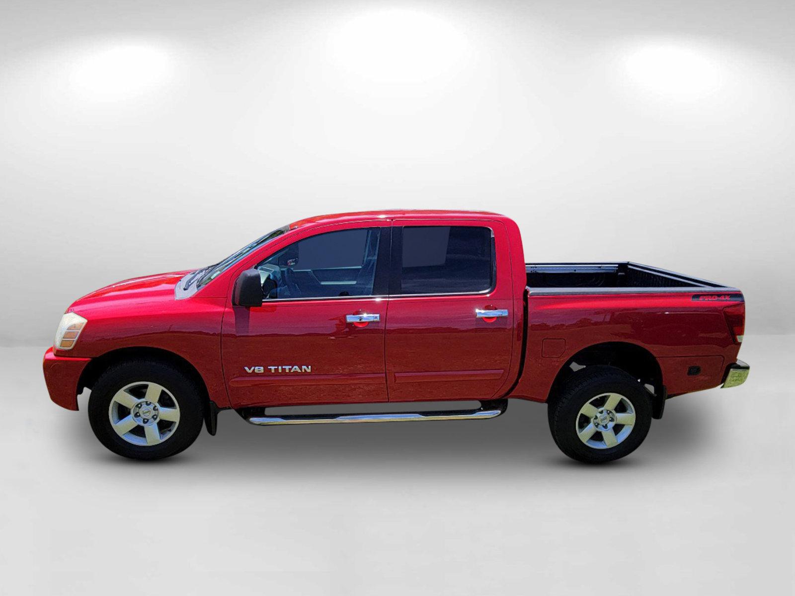 2006 Red Nissan Titan (1N6BA07BX6N) with an Gas/Ethanol V8 5.6L/339 engine, 5-Speed Automatic w/OD transmission, located at 3959 U.S. 80 W, Phenix City, AL, 36870, (334) 297-4885, 32.469296, -85.135185 - 2006 Nissan Titan - Photo#7