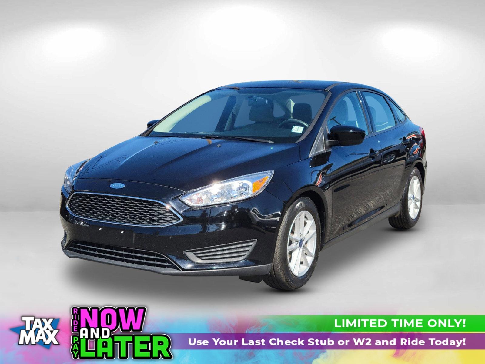 2018 Black Ford Focus SE (1FADP3FEXJL) with an Intercooled Turbo Regular Unleaded I-3 1.0 L/61 engine, located at 7000 Northlake Connector, Columbus, GA, 31904, (706) 987-8085, 32.524975, -84.978134 - 2018 Ford Focus SE - Photo#0