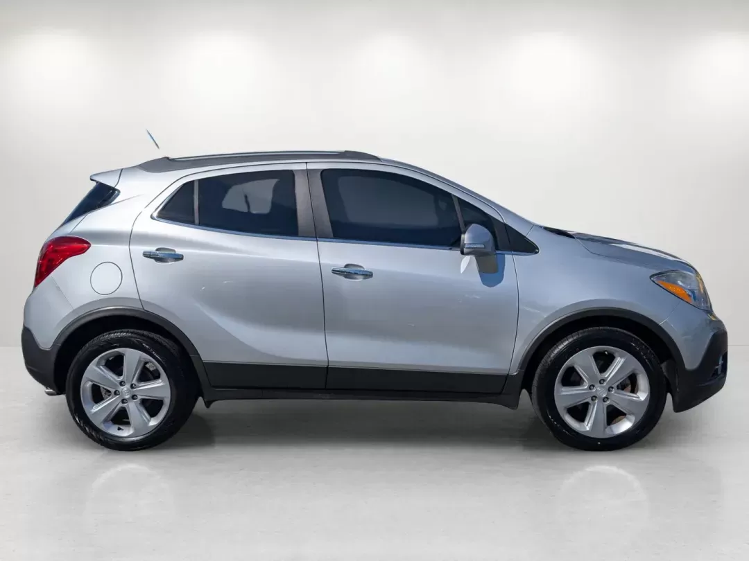 2015 /Ebony Buick Encore Convenience (KL4CJBSB8FB) with an Turbocharged I4 1.4/83 engine, 6-Speed Automatic transmission, located at 804 22nd Ave, Phenix City, AL, 36870, (334) 297-1860, 32.484749, -85.024475 - 2015 Buick Encore Convenience - Photo#4