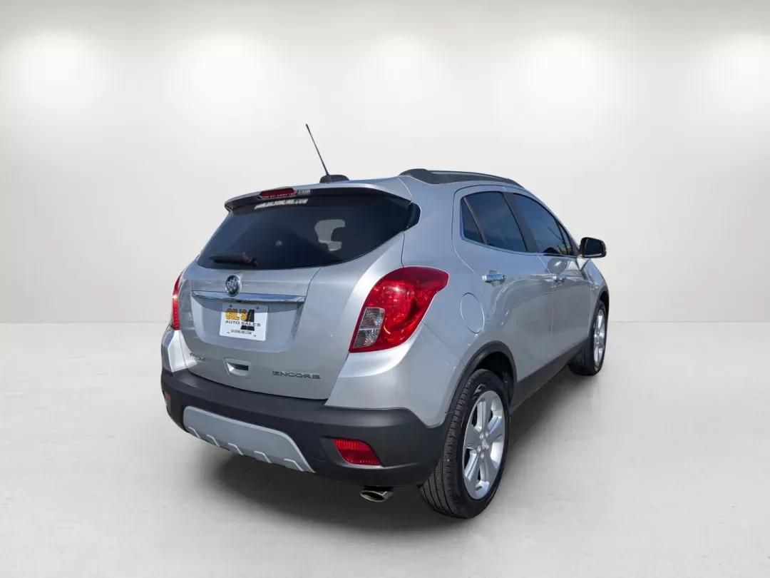 2015 /Ebony Buick Encore Convenience (KL4CJBSB8FB) with an Turbocharged I4 1.4/83 engine, 6-Speed Automatic transmission, located at 804 22nd Ave, Phenix City, AL, 36870, (334) 297-1860, 32.484749, -85.024475 - 2015 Buick Encore Convenience - Photo#5