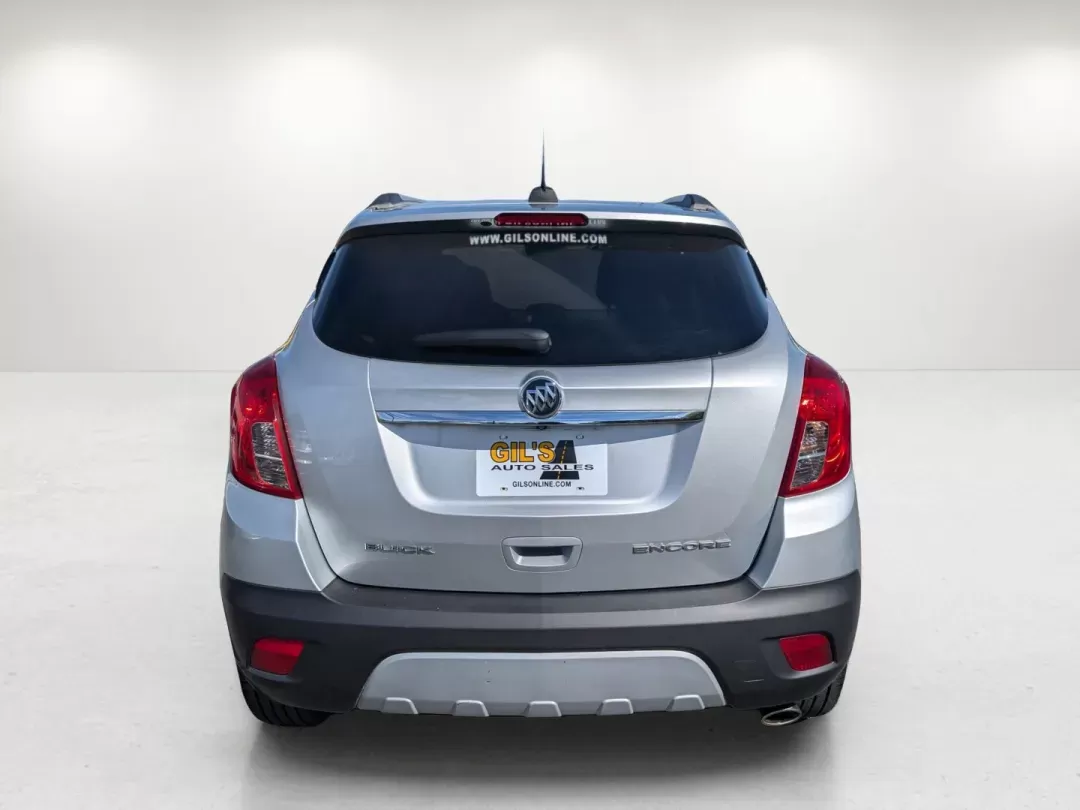 2015 /Ebony Buick Encore Convenience (KL4CJBSB8FB) with an Turbocharged I4 1.4/83 engine, 6-Speed Automatic transmission, located at 804 22nd Ave, Phenix City, AL, 36870, (334) 297-1860, 32.484749, -85.024475 - 2015 Buick Encore Convenience - Photo#6
