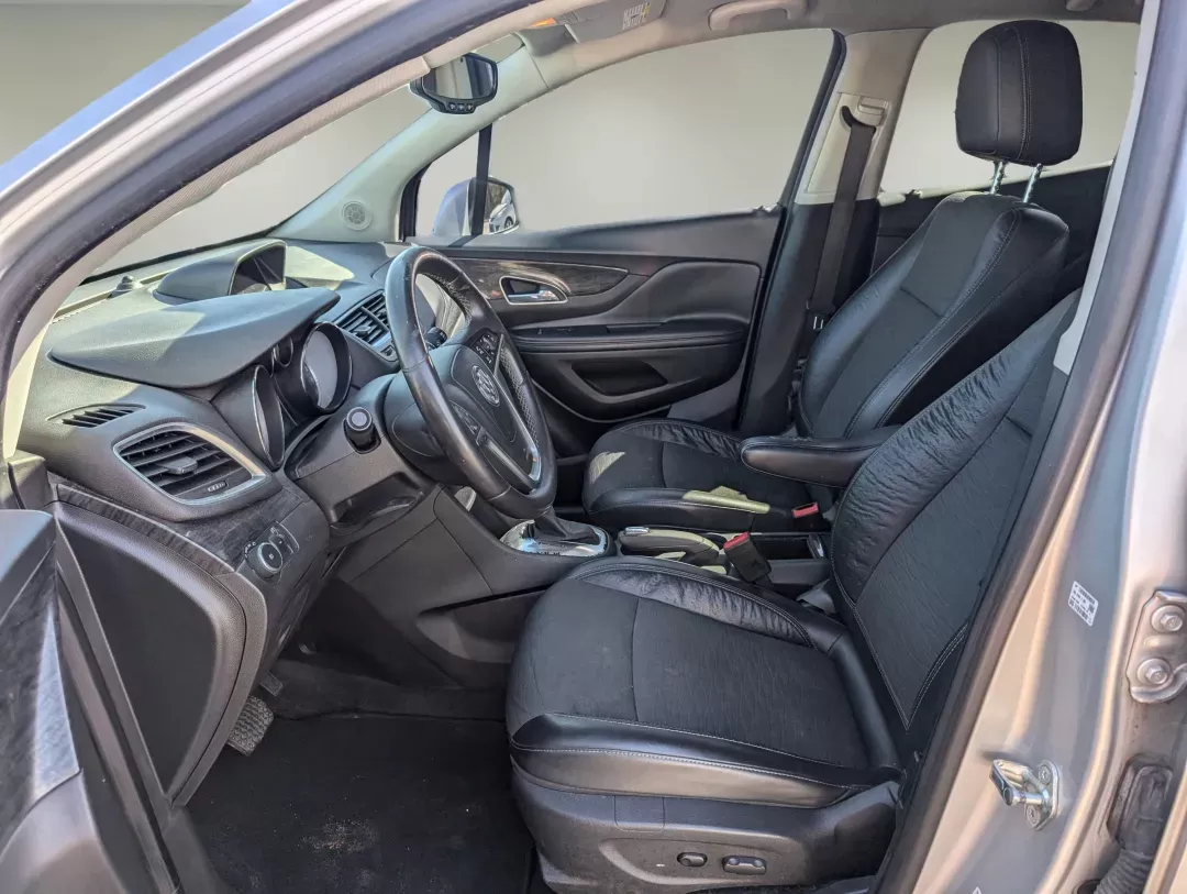 2015 /Ebony Buick Encore Convenience (KL4CJBSB8FB) with an Turbocharged I4 1.4/83 engine, 6-Speed Automatic transmission, located at 804 22nd Ave, Phenix City, AL, 36870, (334) 297-1860, 32.484749, -85.024475 - 2015 Buick Encore Convenience - Photo#10