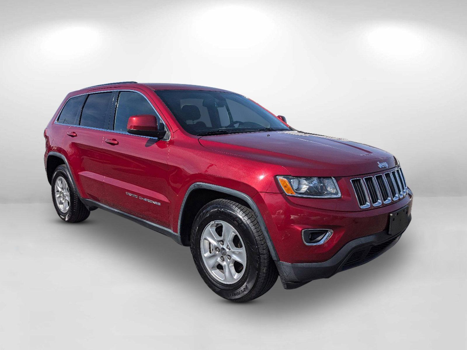 2014 /Black Jeep Grand Cherokee Laredo (1C4RJEAG5EC) with an Regular Unleaded V-6 3.6 L/220 engine, 8-Speed Automatic w/OD transmission, located at 3959 U.S. 80 W, Phenix City, AL, 36870, (334) 297-4885, 32.469296, -85.135185 - 2014 Jeep Grand Cherokee Laredo - Photo#6