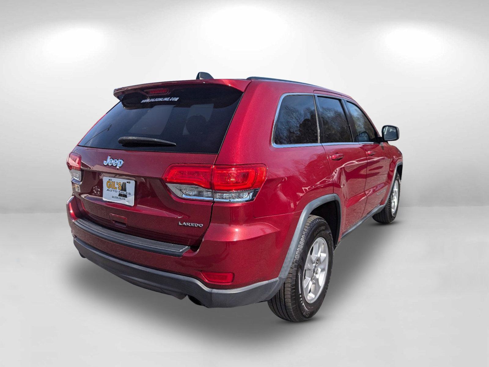 2014 /Black Jeep Grand Cherokee Laredo (1C4RJEAG5EC) with an Regular Unleaded V-6 3.6 L/220 engine, 8-Speed Automatic w/OD transmission, located at 3959 U.S. 80 W, Phenix City, AL, 36870, (334) 297-4885, 32.469296, -85.135185 - 2014 Jeep Grand Cherokee Laredo - Photo#8