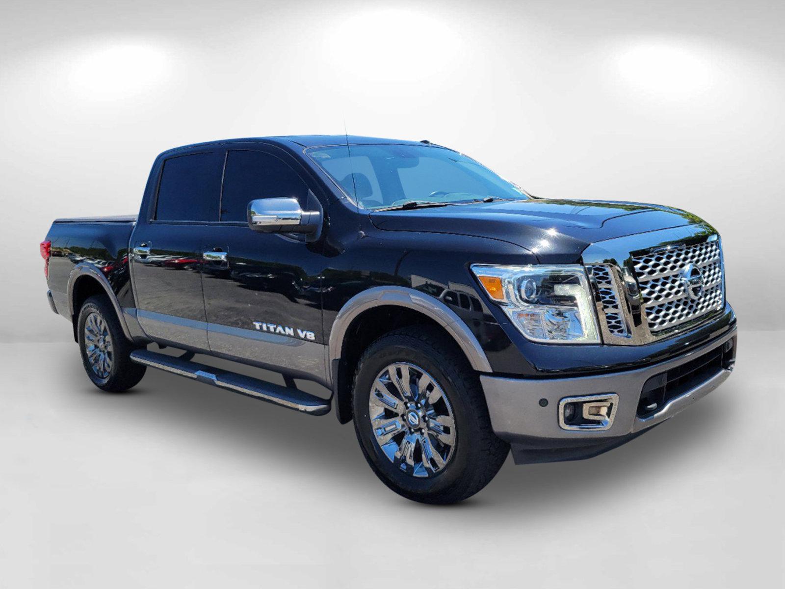 2018 Magnetic Black /Black/Brown Nissan Titan Platinum Reserve (1N6AA1E58JN) with an Regular Unleaded V-8 5.6 L/339 engine, 7-Speed Automatic w/OD transmission, located at 3959 U.S. 80 W, Phenix City, AL, 36870, (334) 297-4885, 32.469296, -85.135185 - 2018 Nissan Titan Platinum Reserve - Photo#2