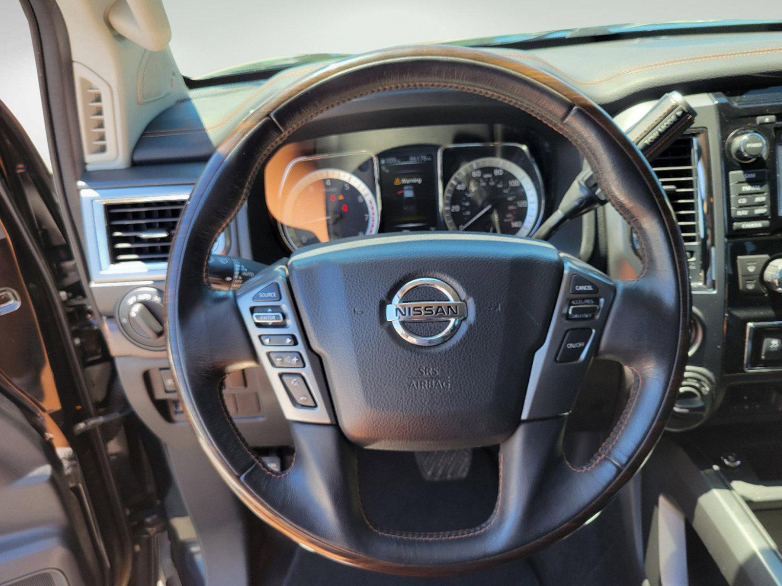 2018 Magnetic Black /Black/Brown Nissan Titan Platinum Reserve (1N6AA1E58JN) with an Regular Unleaded V-8 5.6 L/339 engine, 7-Speed Automatic w/OD transmission, located at 3959 U.S. 80 W, Phenix City, AL, 36870, (334) 297-4885, 32.469296, -85.135185 - 2018 Nissan Titan Platinum Reserve - Photo#12