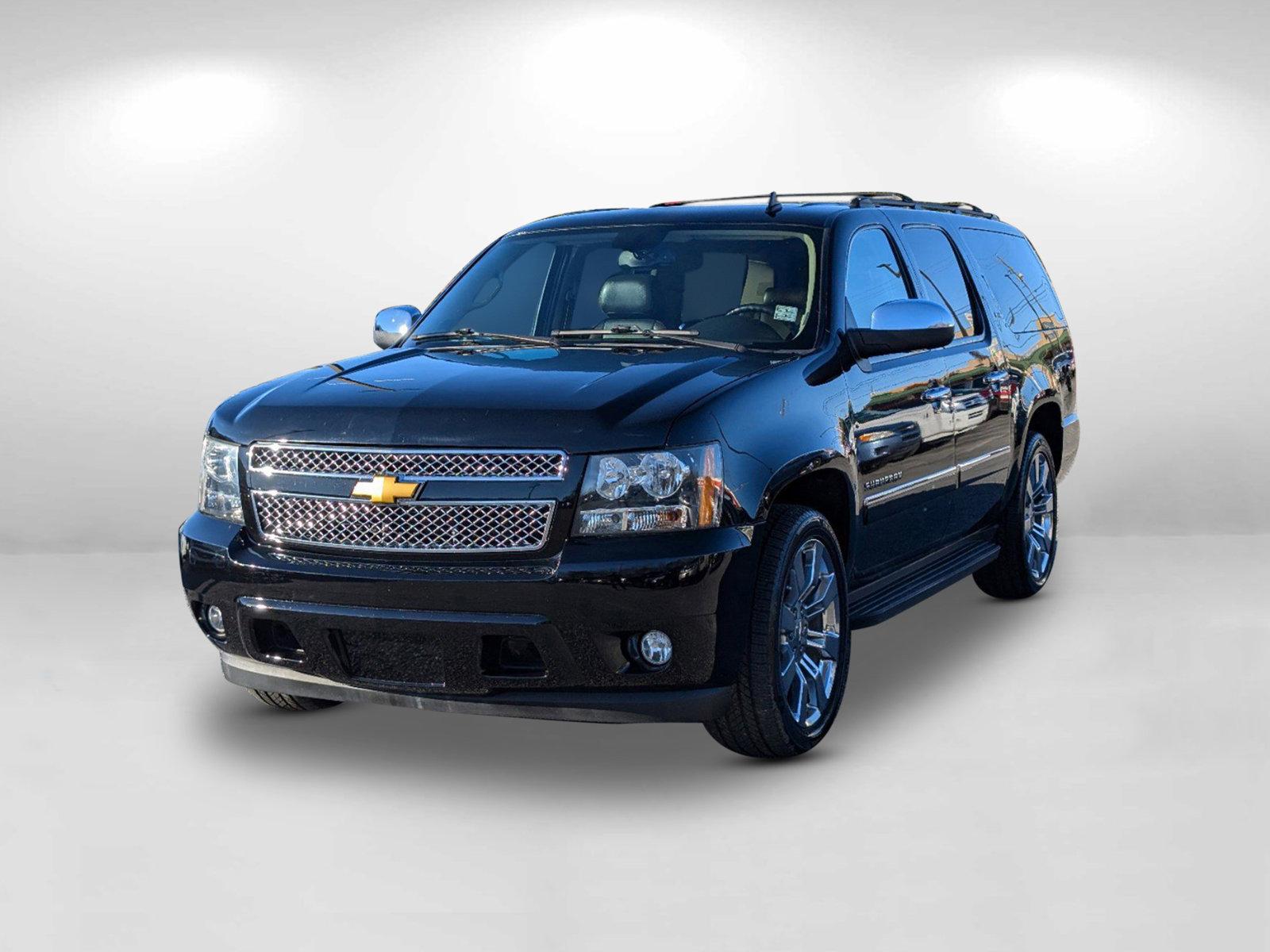 2014 /Ebony Chevrolet Suburban LTZ (1GNSCKE05ER) with an Gas/Ethanol V8 5.3L/323 engine, 6-Speed Automatic transmission, located at 7000 Northlake Connector, Columbus, GA, 31904, (706) 987-8085, 32.524975, -84.978134 - 2014 Chevrolet Suburban LTZ - Photo#1