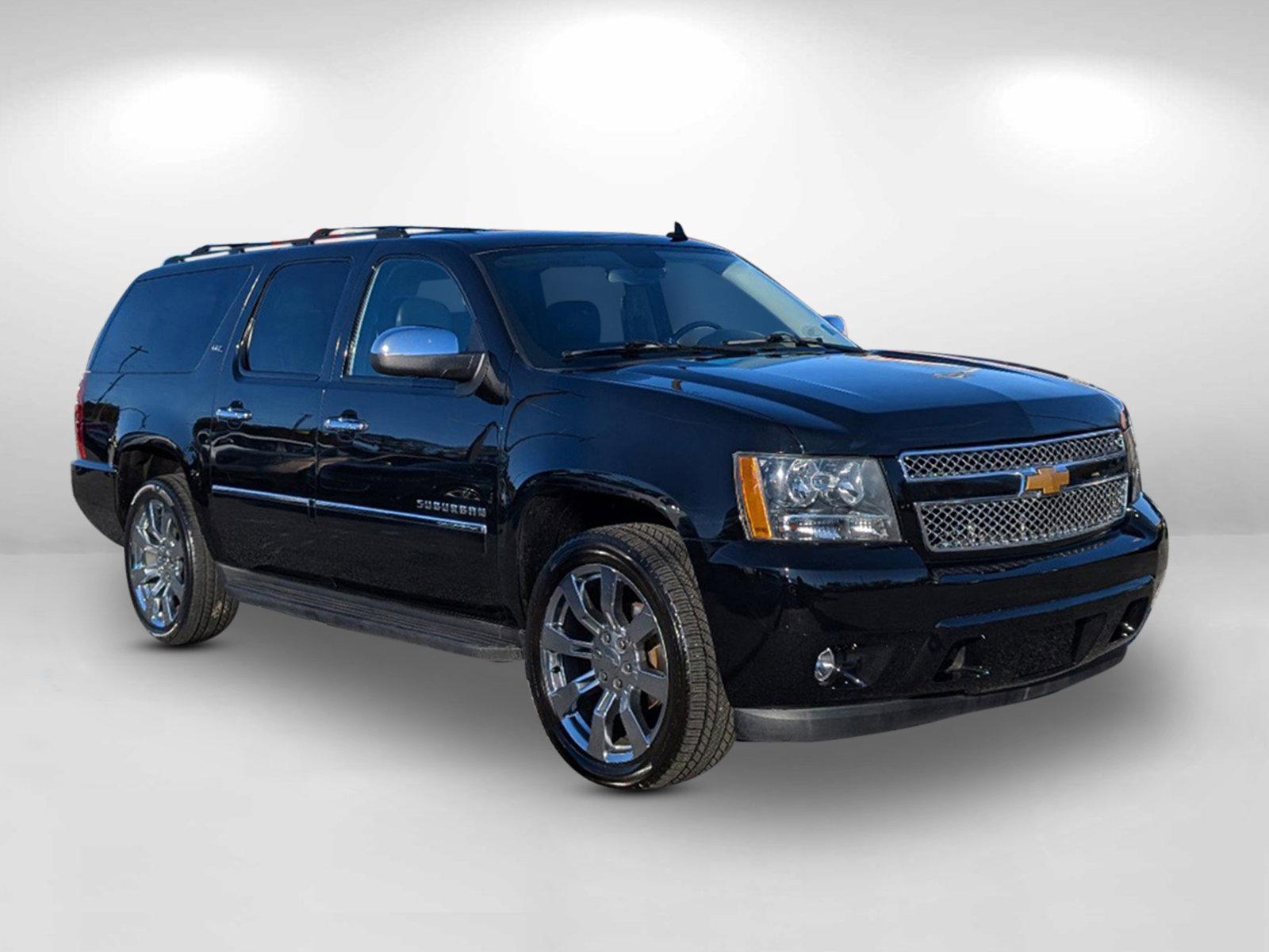 2014 /Ebony Chevrolet Suburban LTZ (1GNSCKE05ER) with an Gas/Ethanol V8 5.3L/323 engine, 6-Speed Automatic transmission, located at 7000 Northlake Connector, Columbus, GA, 31904, (706) 987-8085, 32.524975, -84.978134 - 2014 Chevrolet Suburban LTZ - Photo#3