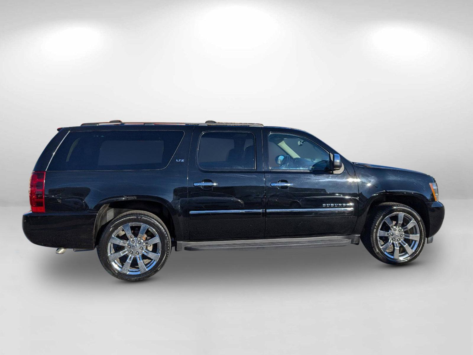 2014 /Ebony Chevrolet Suburban LTZ (1GNSCKE05ER) with an Gas/Ethanol V8 5.3L/323 engine, 6-Speed Automatic transmission, located at 7000 Northlake Connector, Columbus, GA, 31904, (706) 987-8085, 32.524975, -84.978134 - 2014 Chevrolet Suburban LTZ - Photo#4