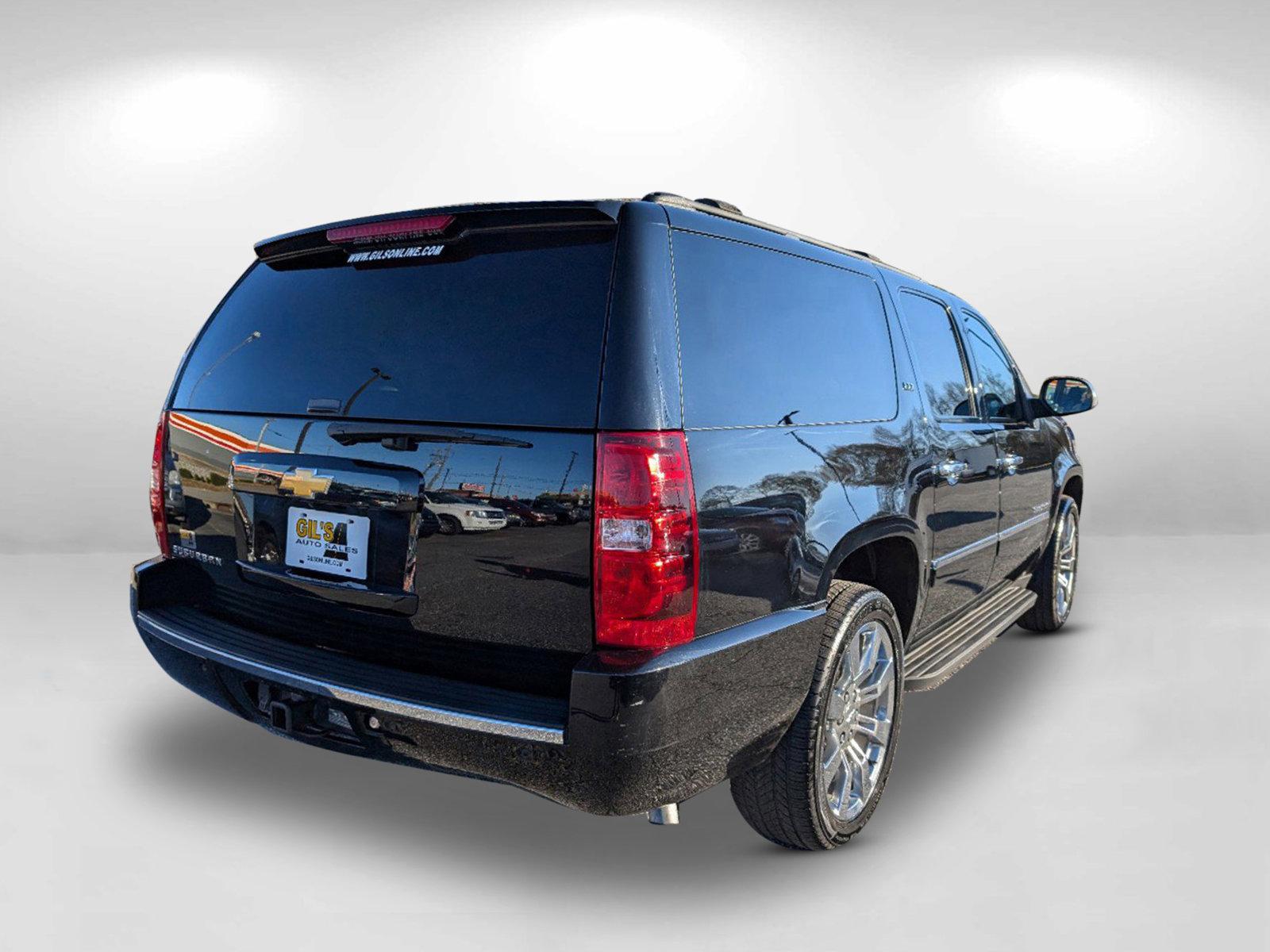 2014 /Ebony Chevrolet Suburban LTZ (1GNSCKE05ER) with an Gas/Ethanol V8 5.3L/323 engine, 6-Speed Automatic transmission, located at 7000 Northlake Connector, Columbus, GA, 31904, (706) 987-8085, 32.524975, -84.978134 - 2014 Chevrolet Suburban LTZ - Photo#5