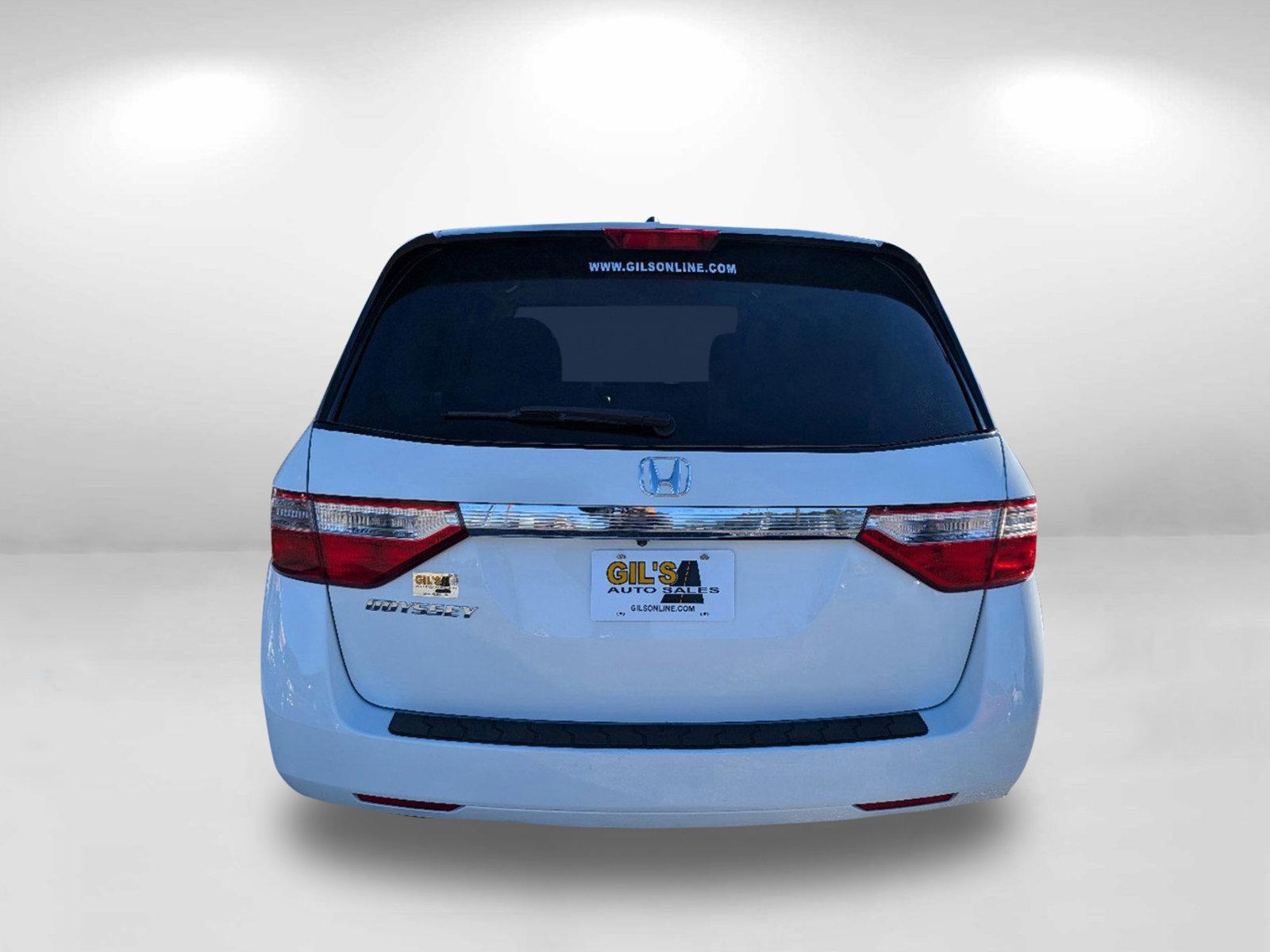 2012 Honda Odyssey EX-L (5FNRL5H62CB) with an Gas V6 3.5L/212 engine, 5-Speed Automatic transmission, located at 804 22nd Ave, Phenix City, AL, 36870, (334) 297-1860, 32.484749, -85.024475 - 2012 Honda Odyssey EX-L - Photo#5