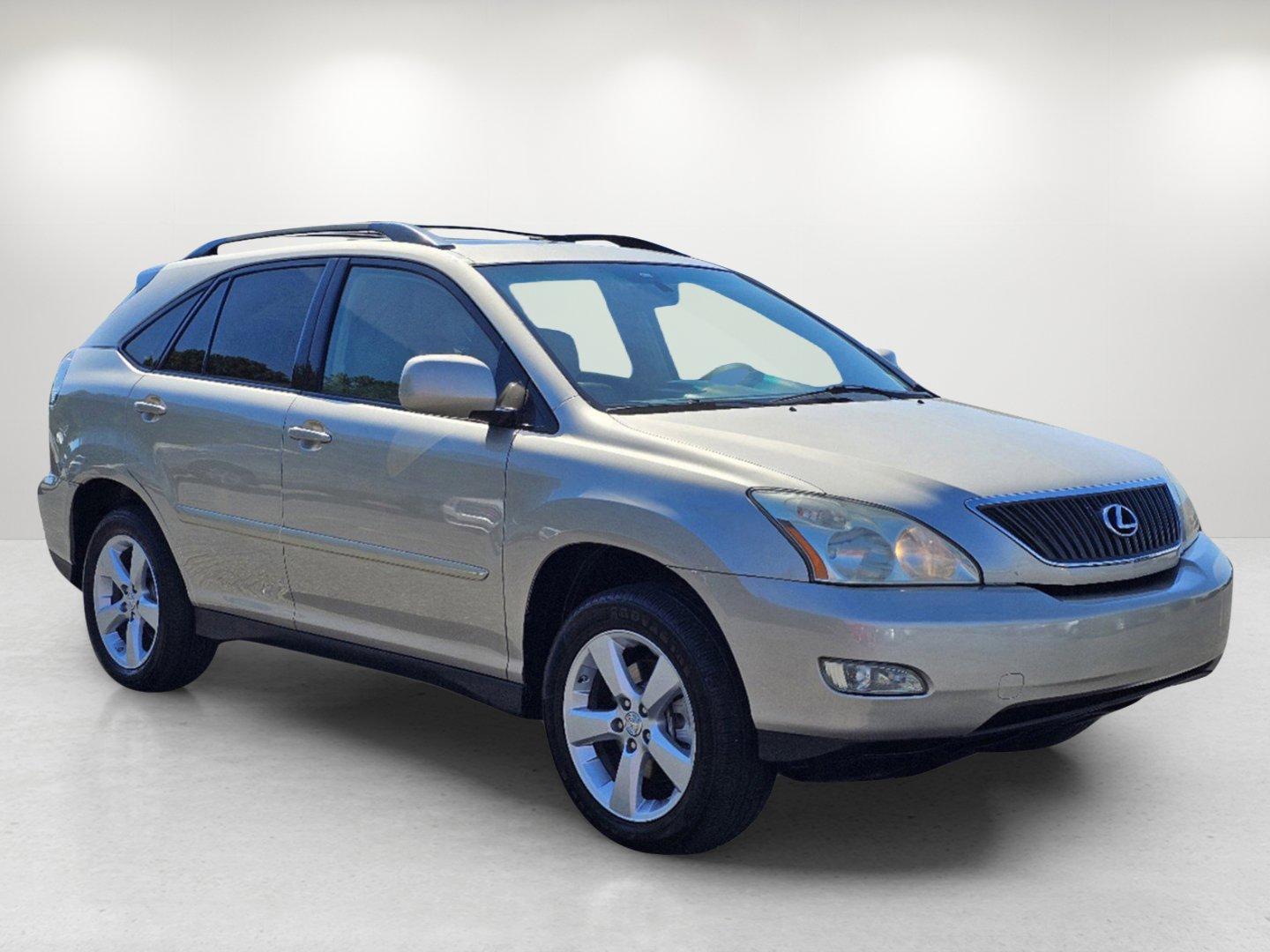 2007 Bamboo Pearl /Ivory Lexus RX 350 (2T2GK31U47C) with an Gas V6 3.5L/210 engine, 5-Speed Automatic transmission, located at 5115 14th Ave., Columbus, GA, 31904, (706) 323-0345, 32.511494, -84.971046 - 2007 Lexus RX 350 - Photo#2