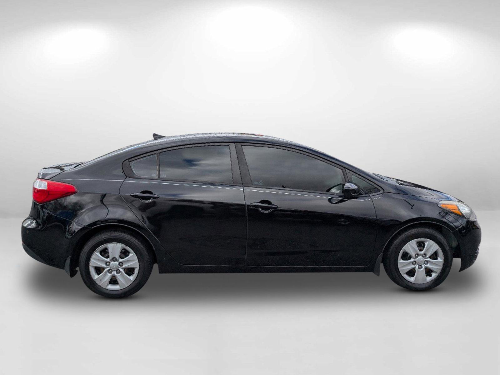 2016 /Black Kia Forte LX (KNAFK4A64G5) with an Regular Unleaded I-4 1.8 L/110 engine, 6-Speed Automatic w/OD transmission, located at 1430 Gateway Drive, Opelika, AL, 36801, (334) 239-0944, 32.637871, -85.409790 - 2016 Kia Forte LX - Photo#3