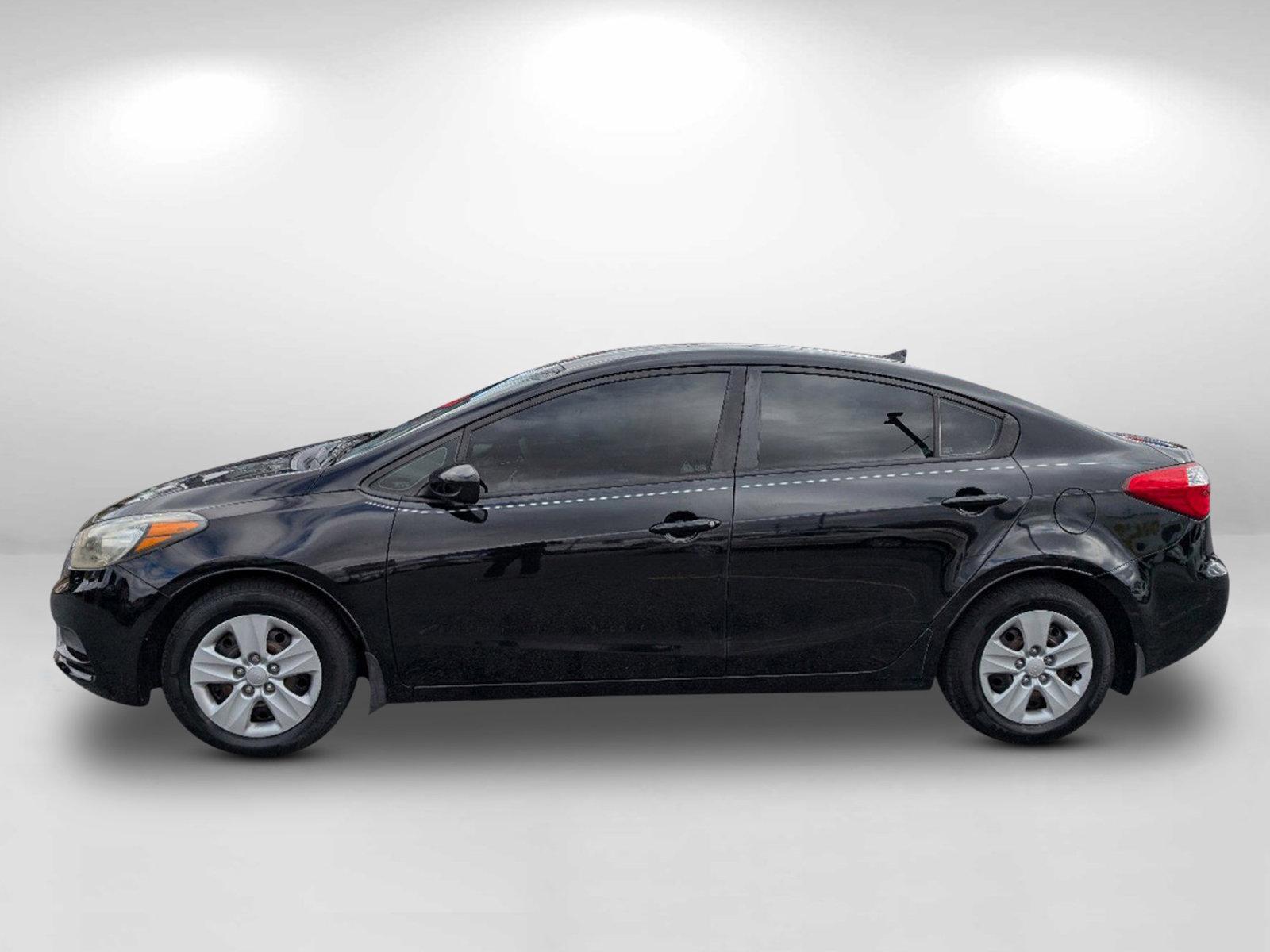 2016 /Black Kia Forte LX (KNAFK4A64G5) with an Regular Unleaded I-4 1.8 L/110 engine, 6-Speed Automatic w/OD transmission, located at 1430 Gateway Drive, Opelika, AL, 36801, (334) 239-0944, 32.637871, -85.409790 - 2016 Kia Forte LX - Photo#7